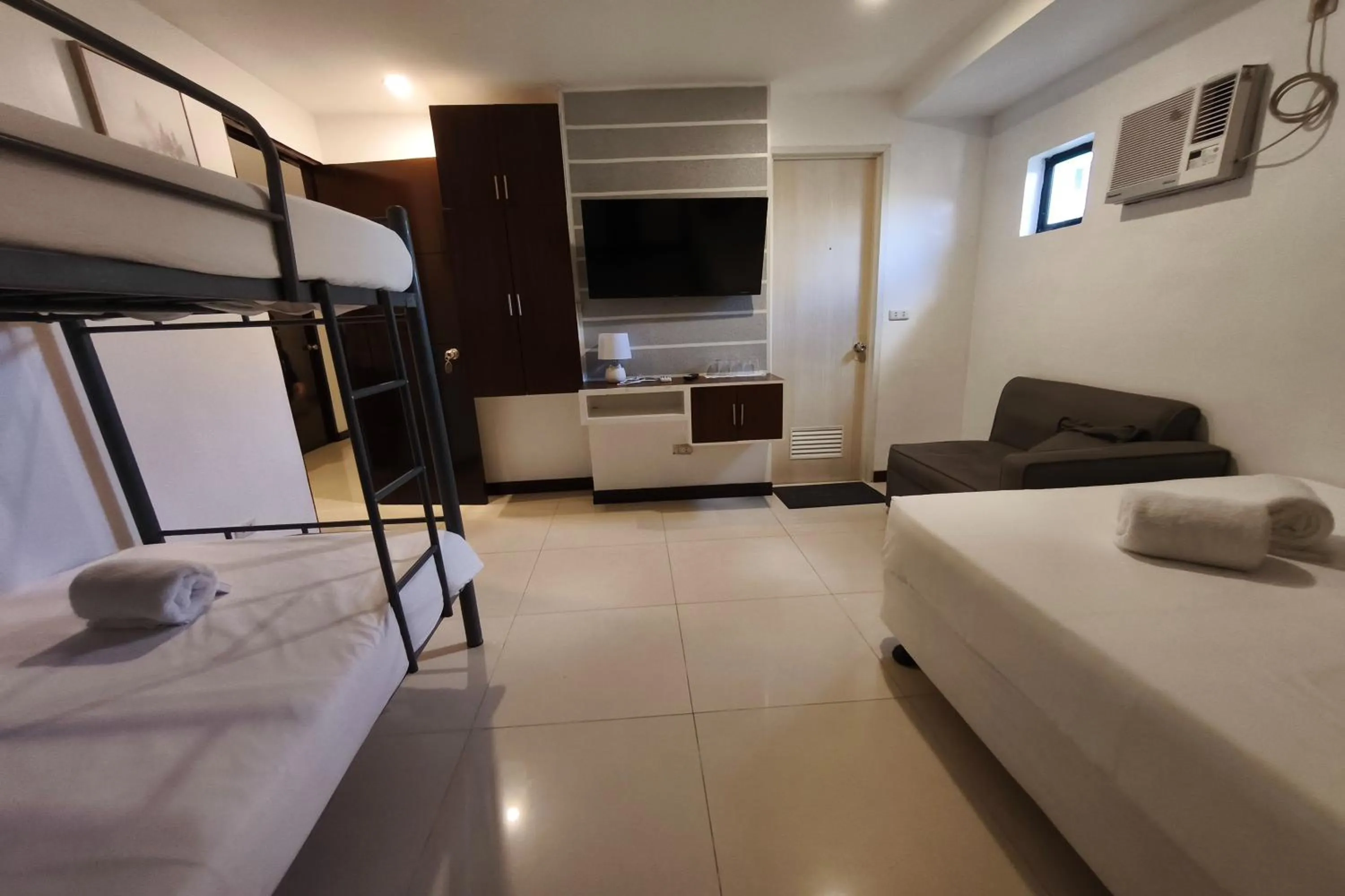 Photo of the whole room, Bed in Ecoland 88 Apartelle and Suite near SM Davao