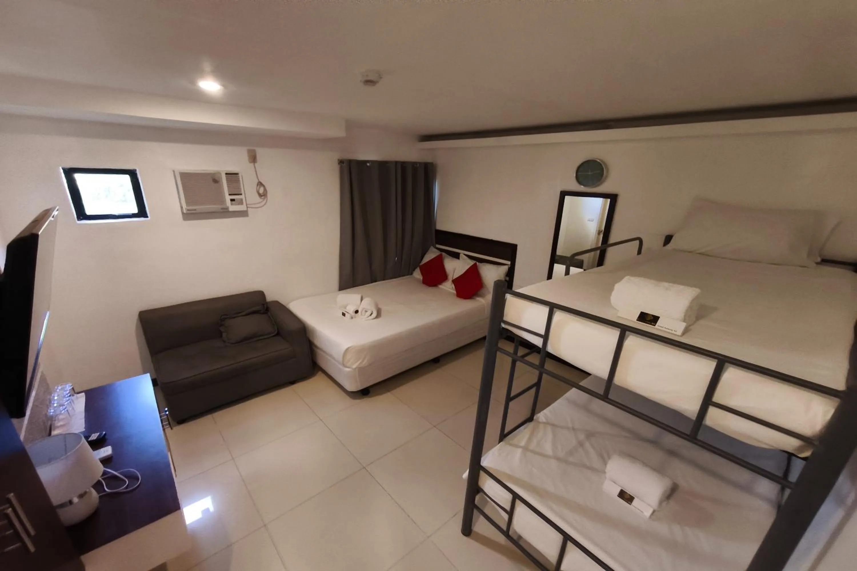 Photo of the whole room, Bed in Ecoland 88 Apartelle and Suite near SM Davao