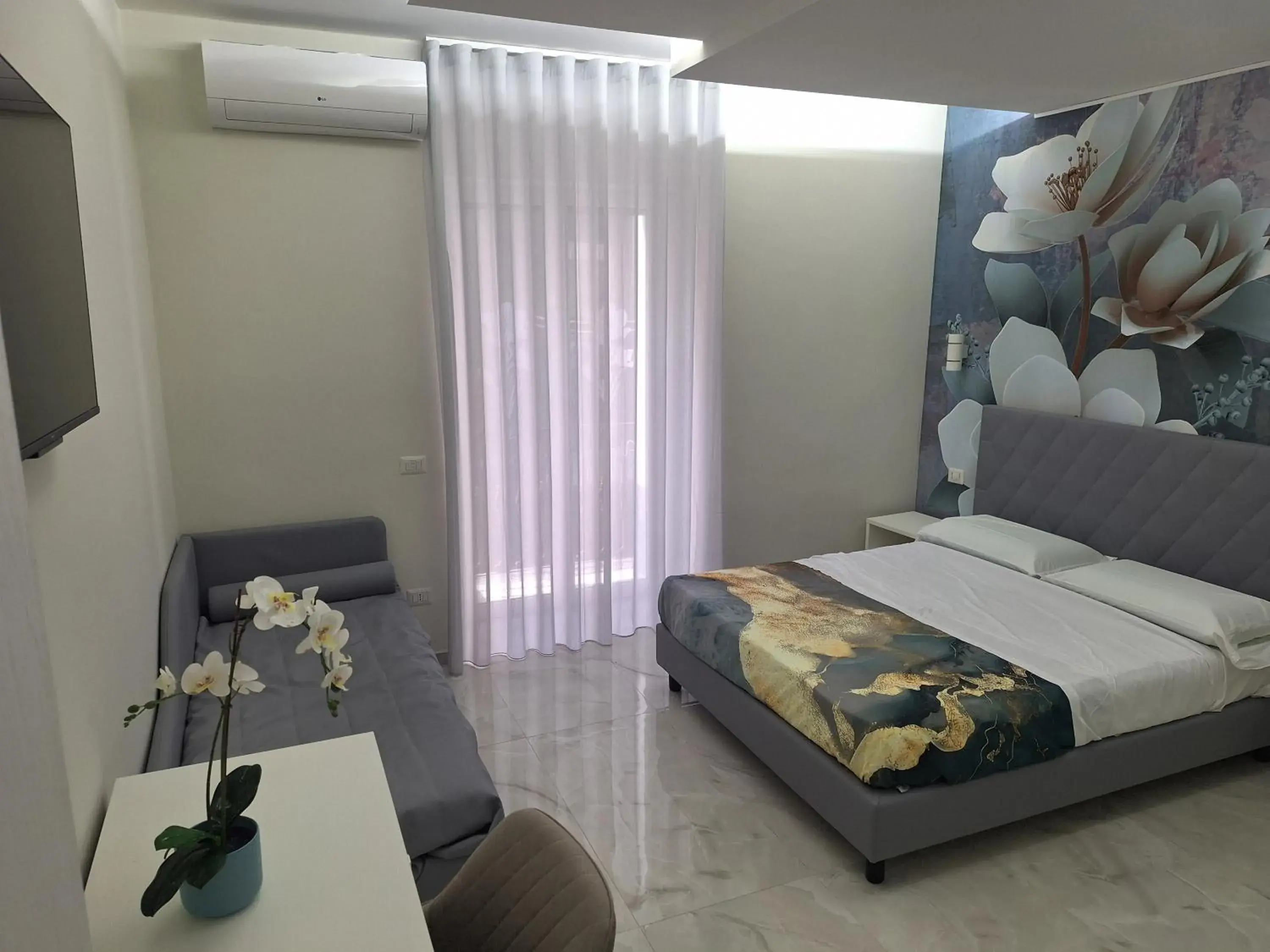 Comfort Triple Room in La Violetta Comfort Triple Room in La Violetta