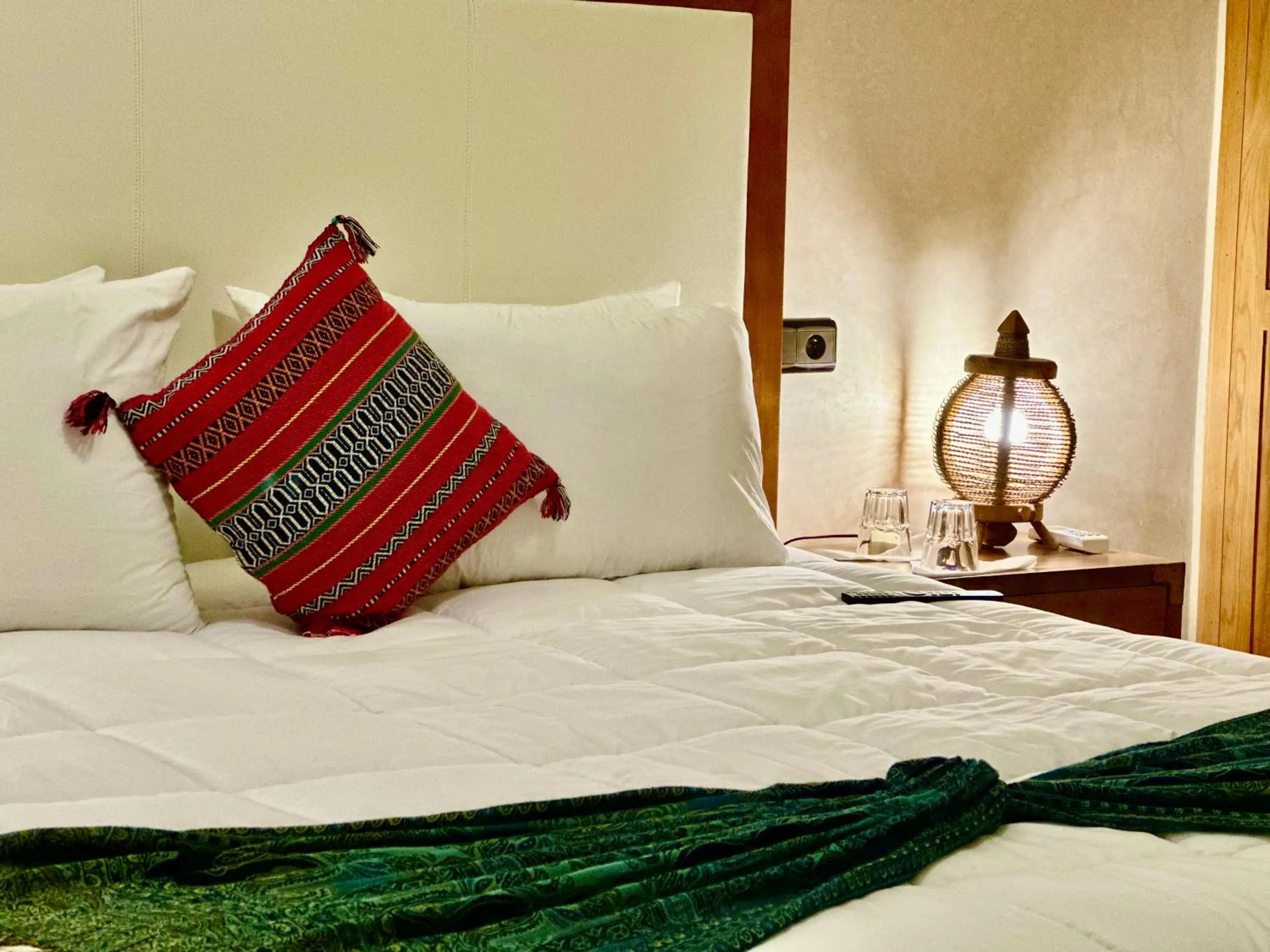 Bedroom in Riad Tislite & SPA