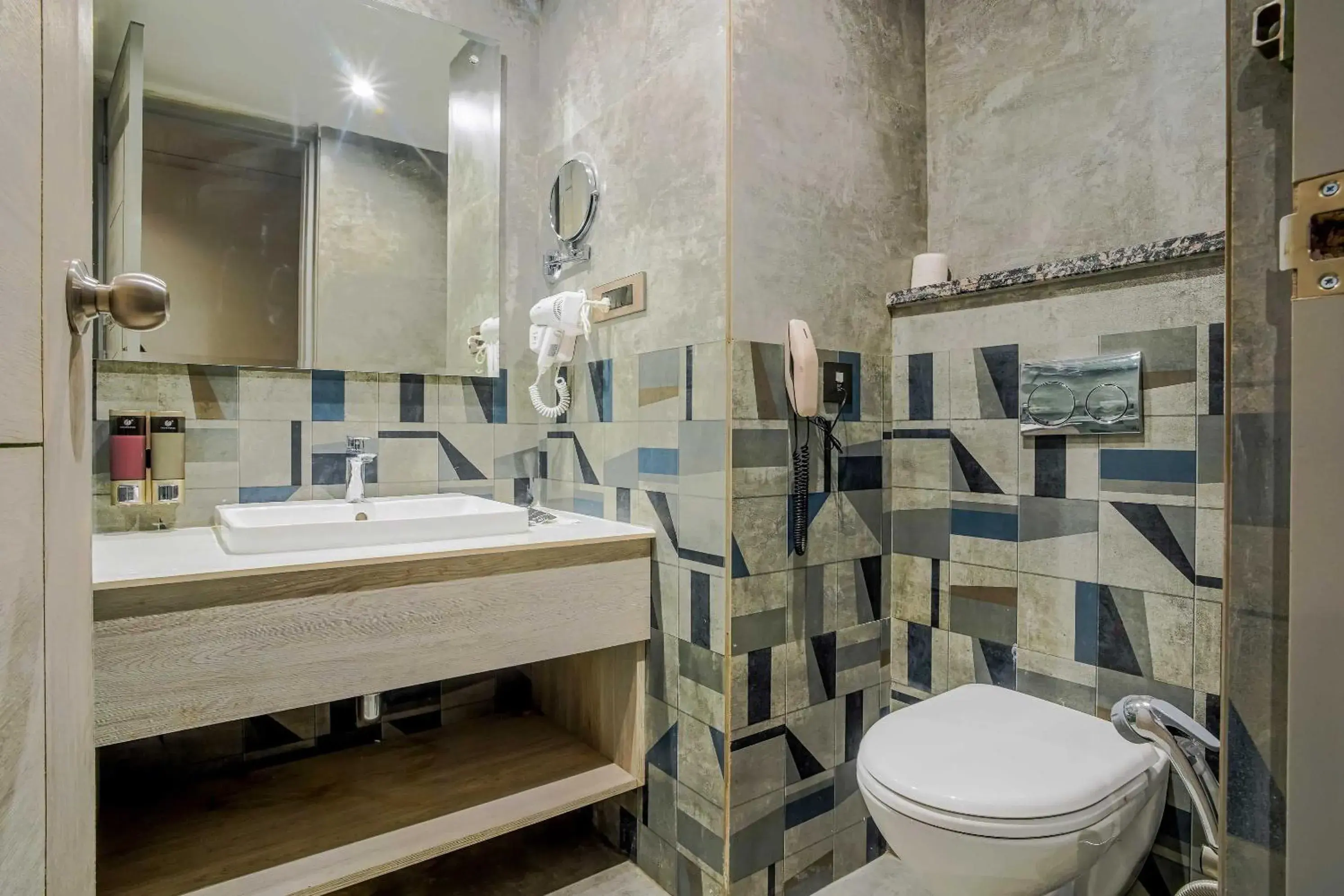 Bathroom in Clubhouse Hotel by CheckIn Chandigarh Mohali Bathroom in Clubhouse Hotel by CheckIn Chandigarh Mohali