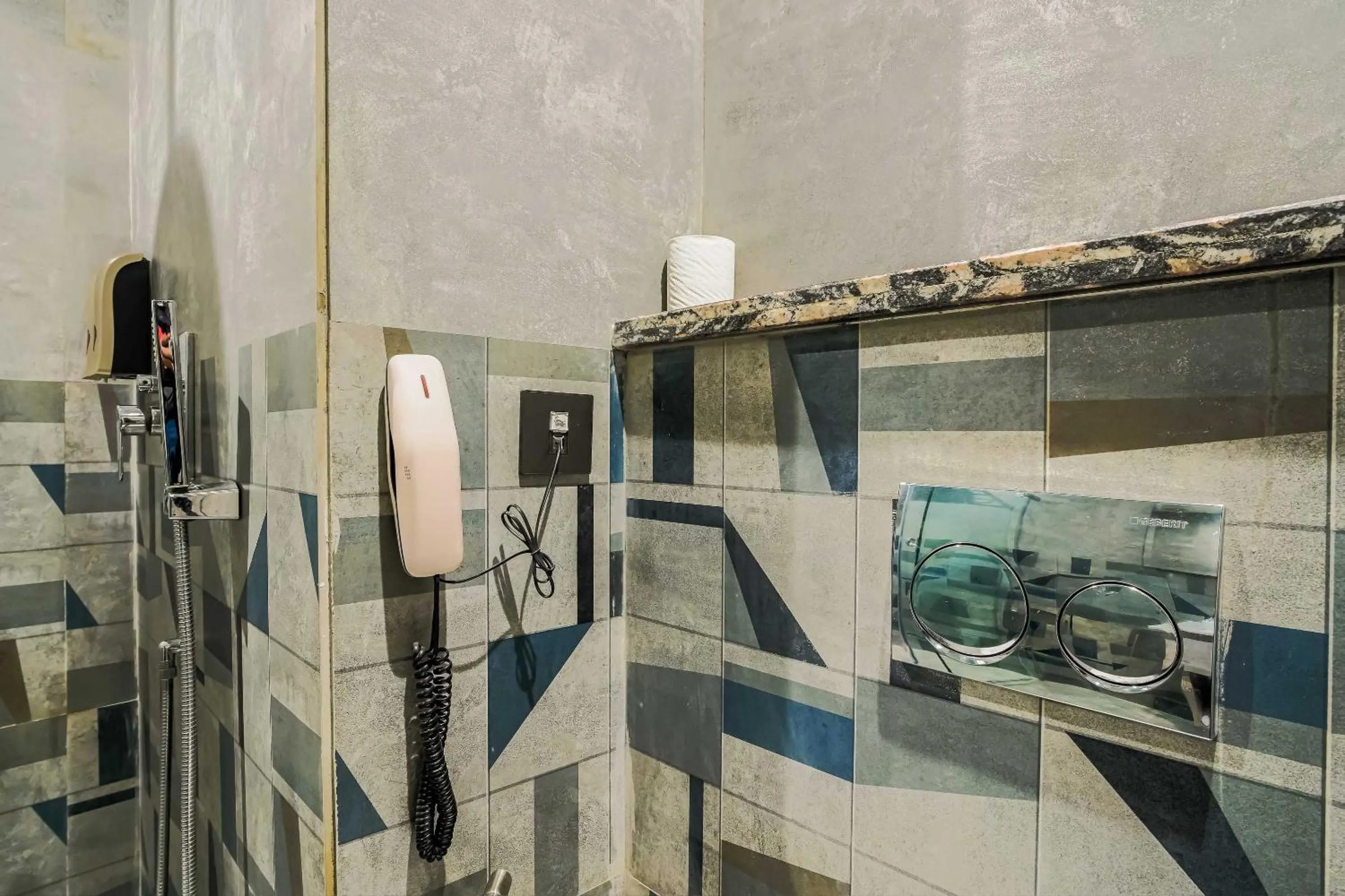 Bathroom in Clubhouse Hotel by CheckIn Chandigarh Mohali