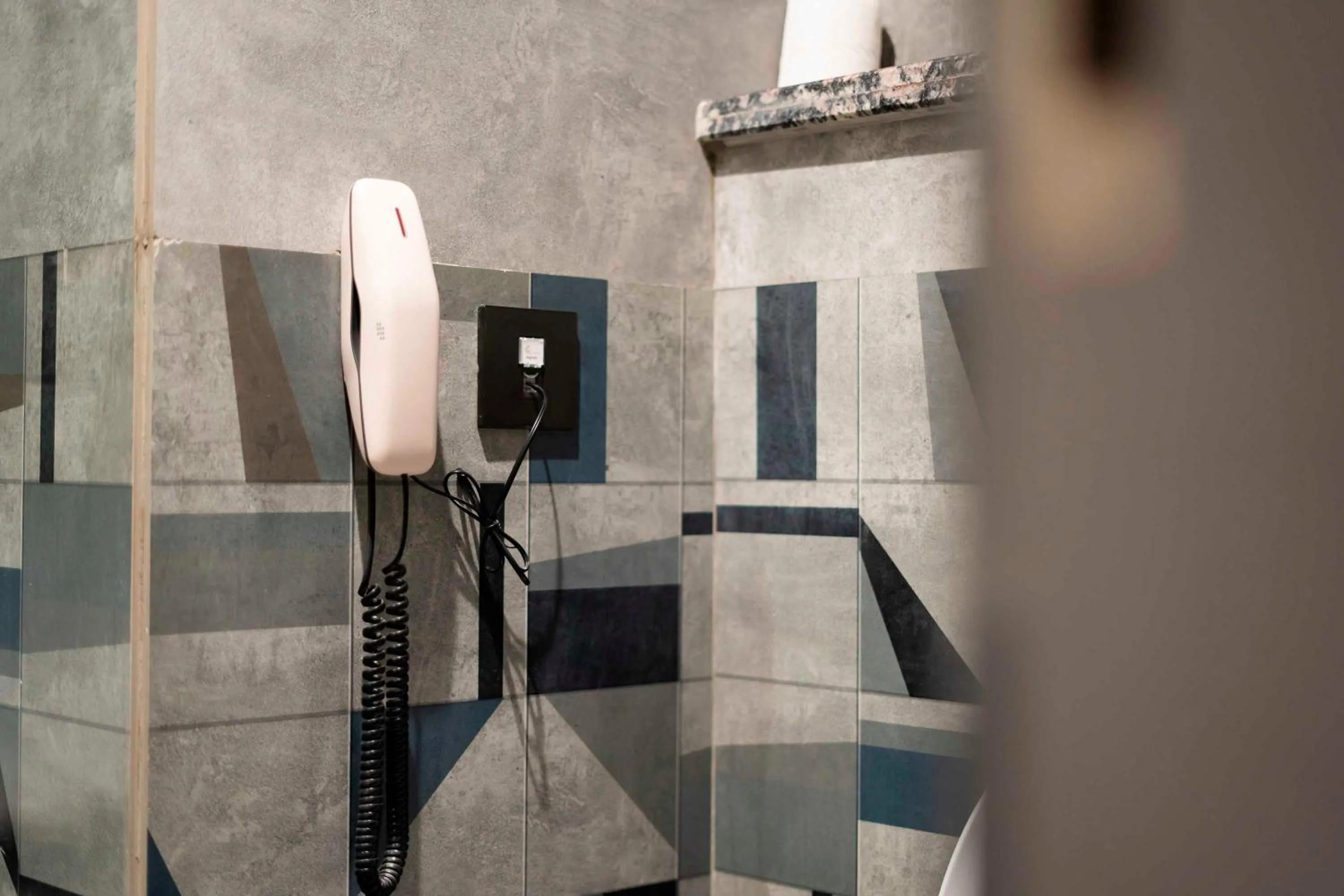 Bathroom in Clubhouse Hotel by CheckIn Chandigarh Mohali