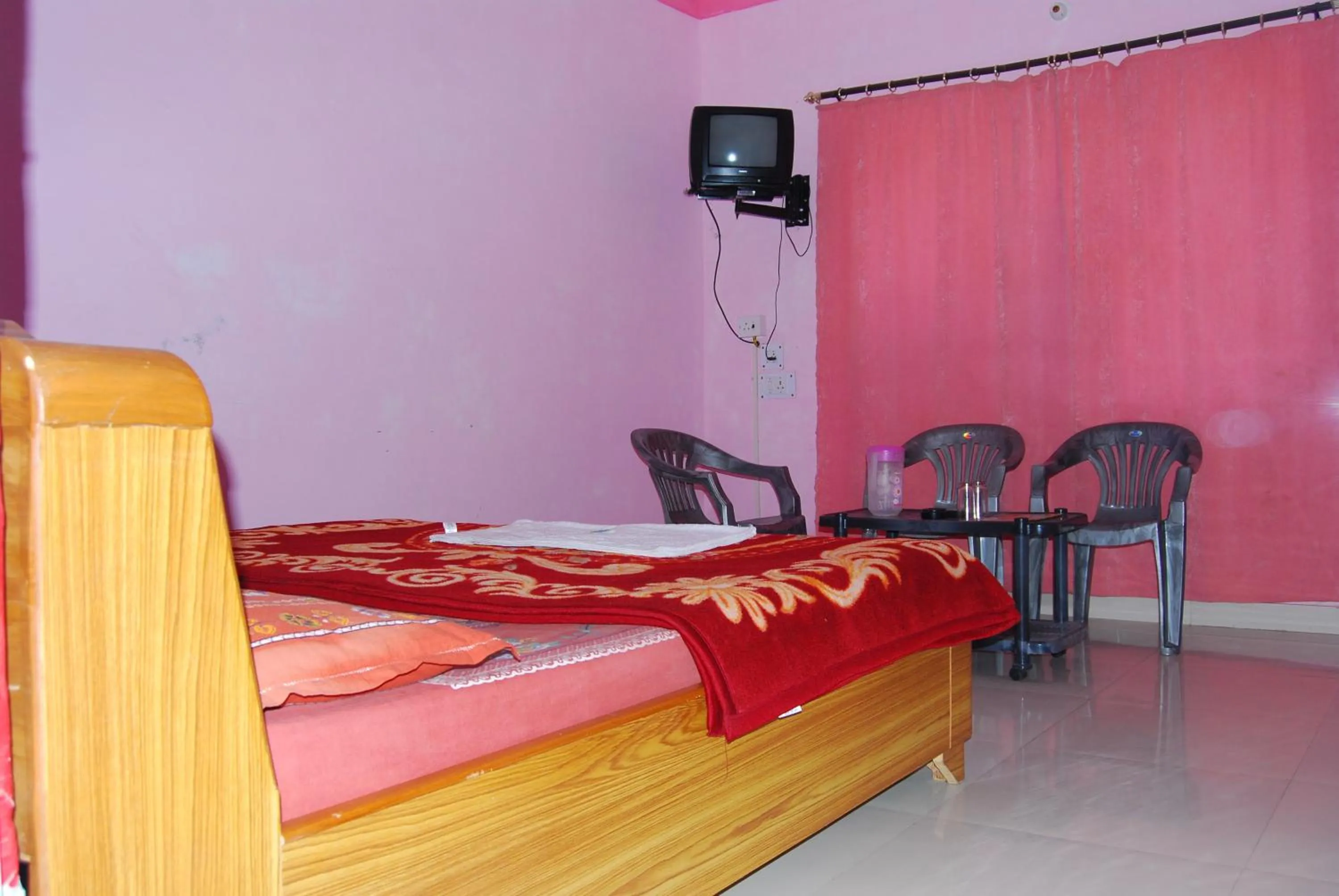 Bed in Hotel Shiv Ganga