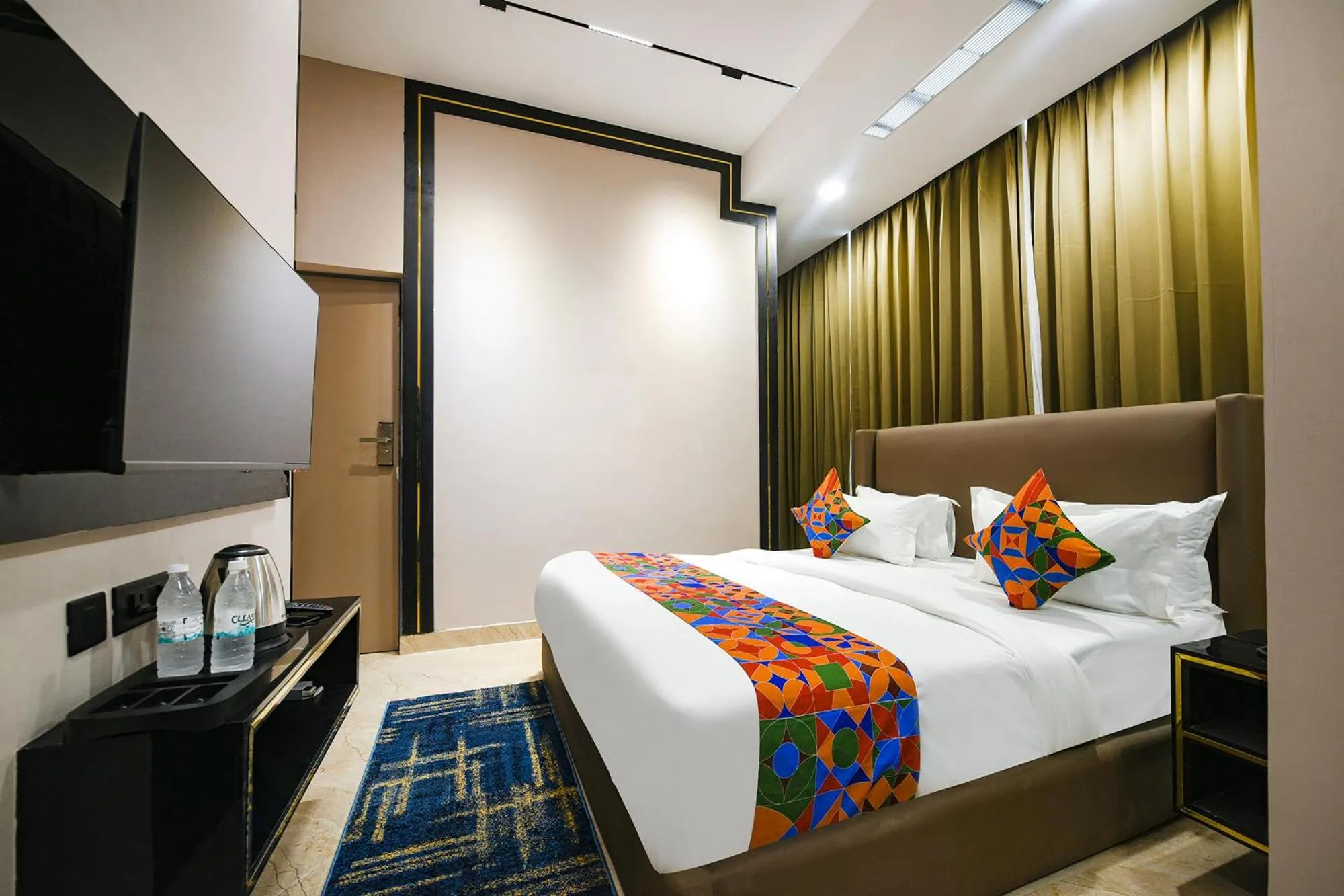 Bed in FabHotel Prime Elegance Suites