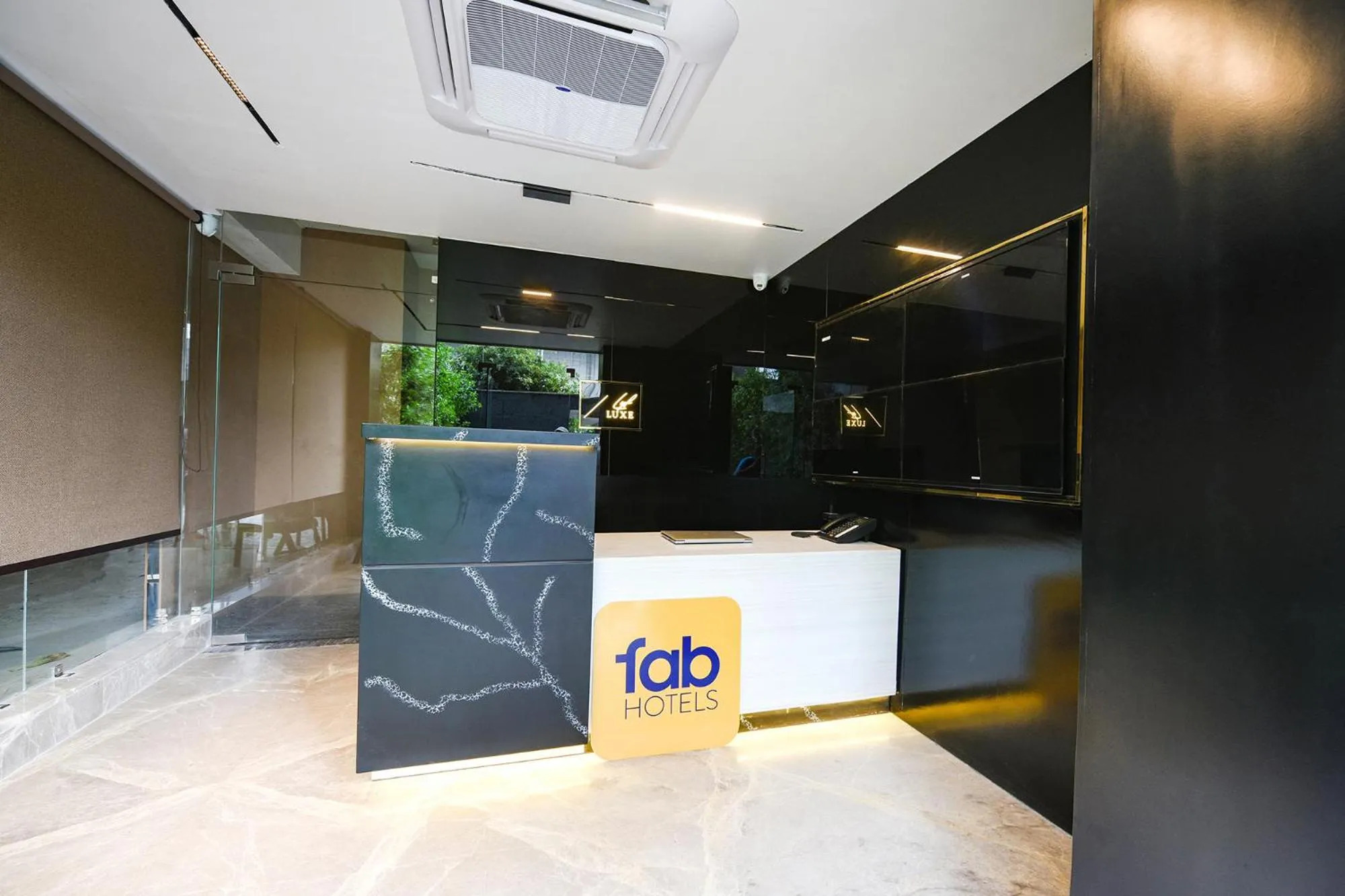 Lobby or reception in FabHotel Prime Elegance Suites