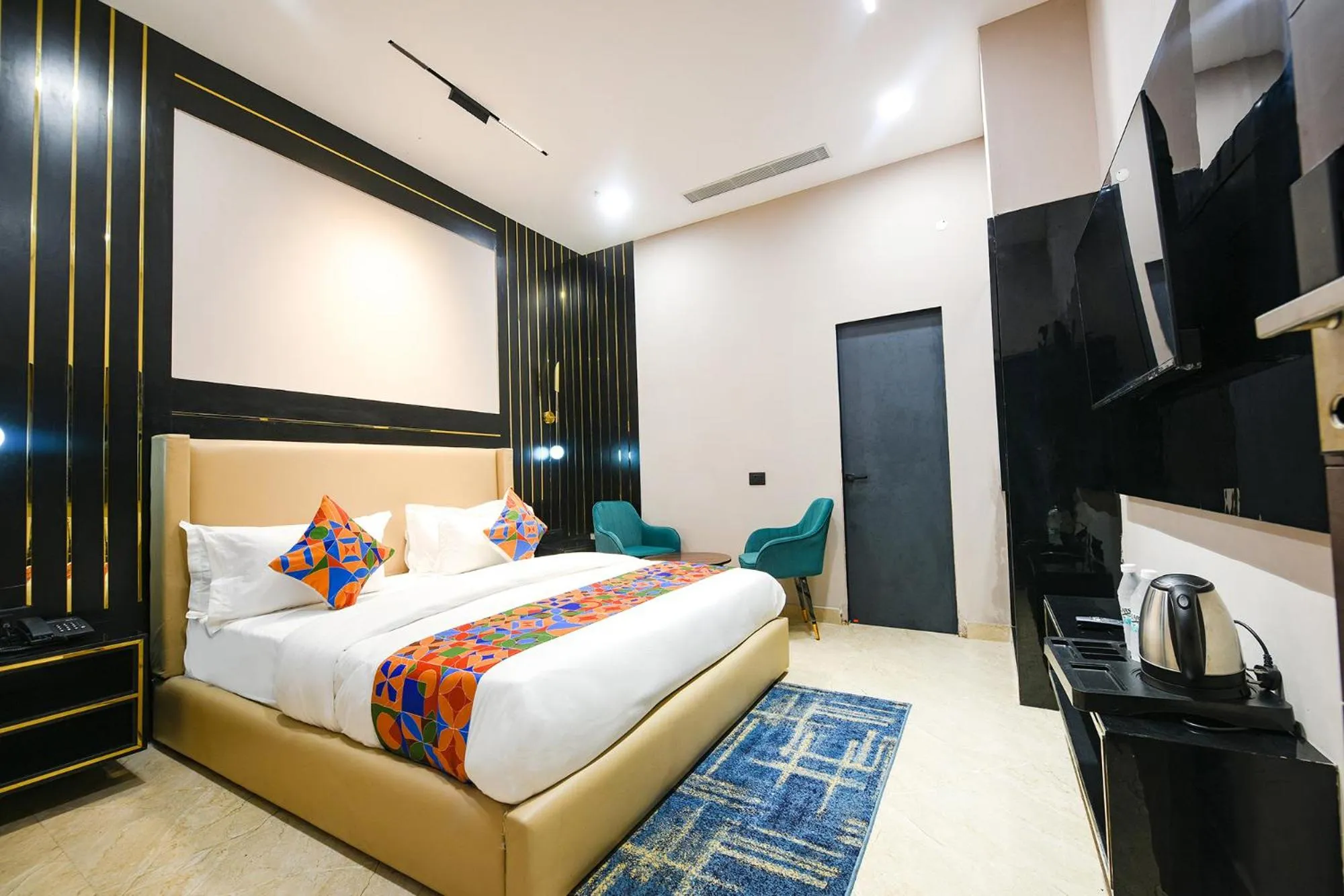 Bed in FabHotel Prime Elegance Suites