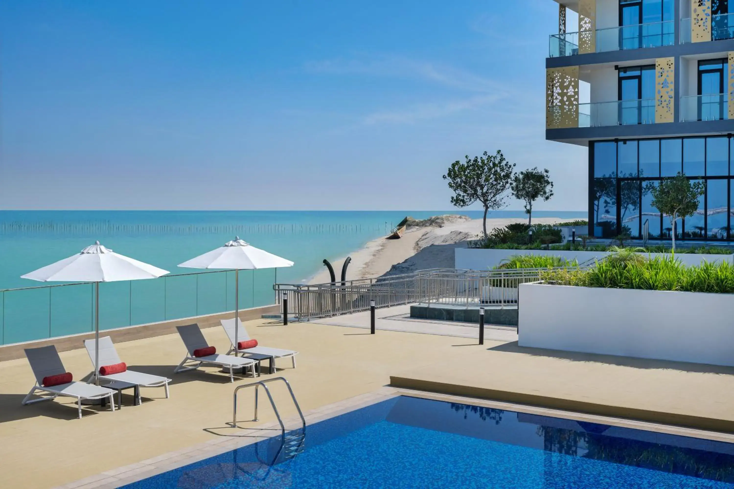 Swimming pool in Beach Bay Hotel Mirfa Swimming pool in Beach Bay Hotel Mirfa