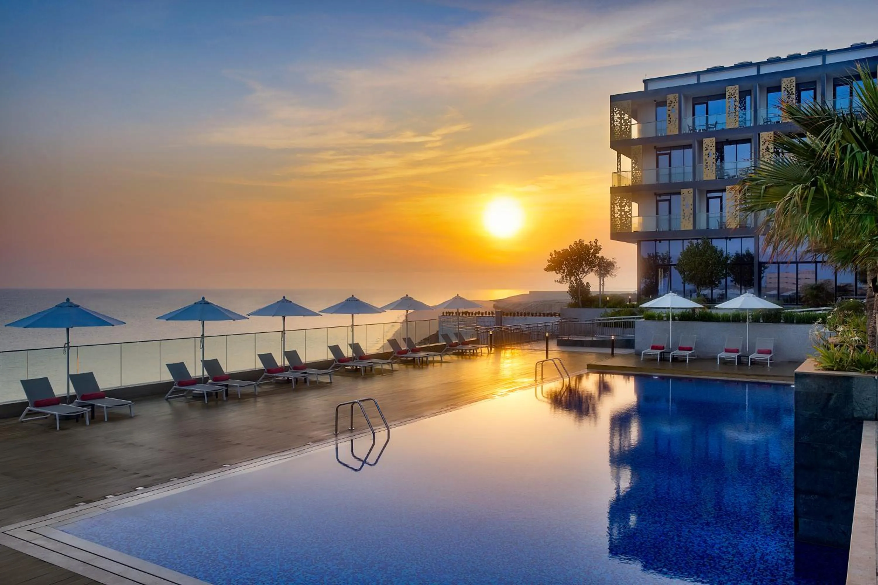 Swimming pool in Beach Bay Hotel Mirfa