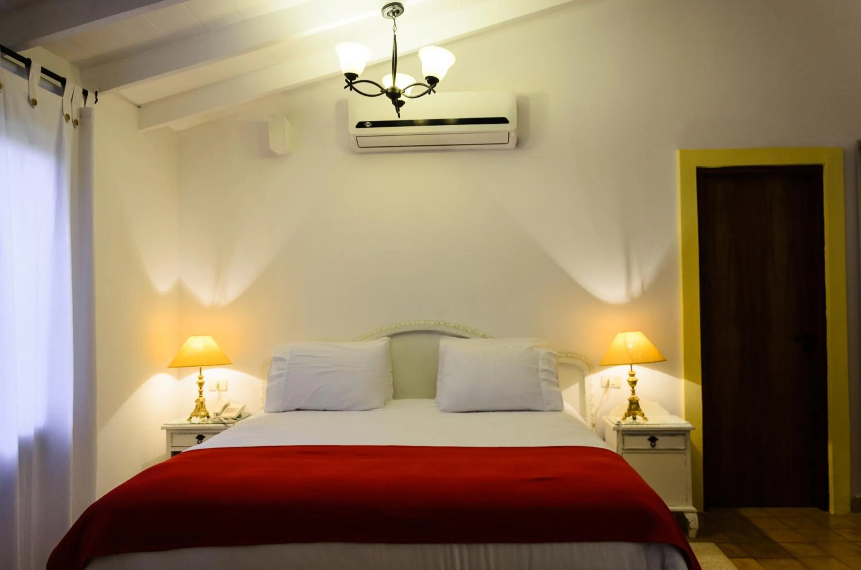 Bed in La Casona Hotel Boutique