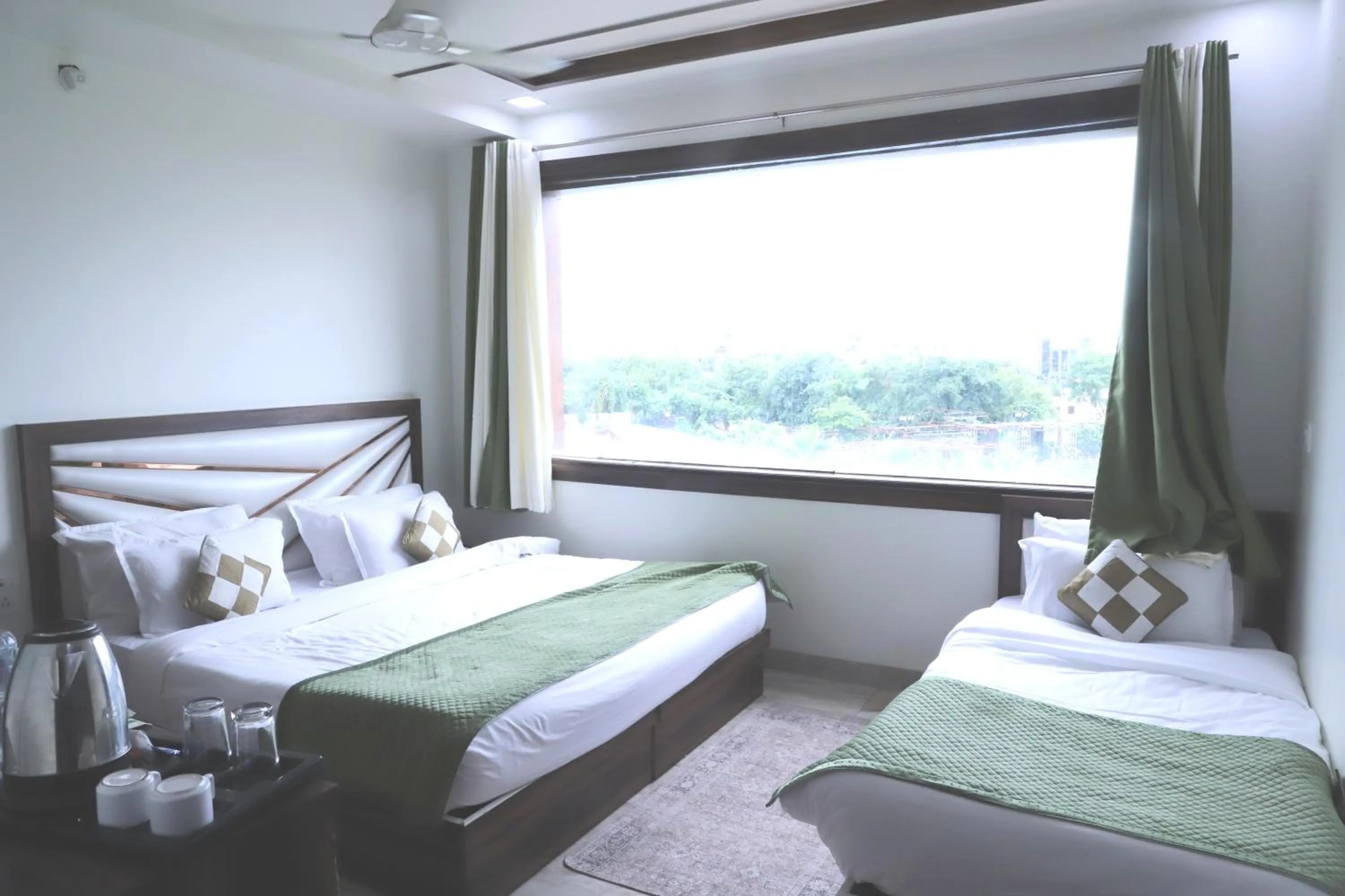 Bed in The Crown Hotel Agra near Taj Mahal & Restaurant