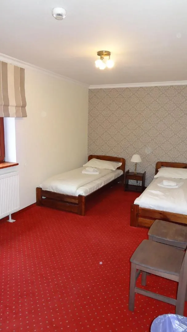 Bed in Dworek Szwajcaria