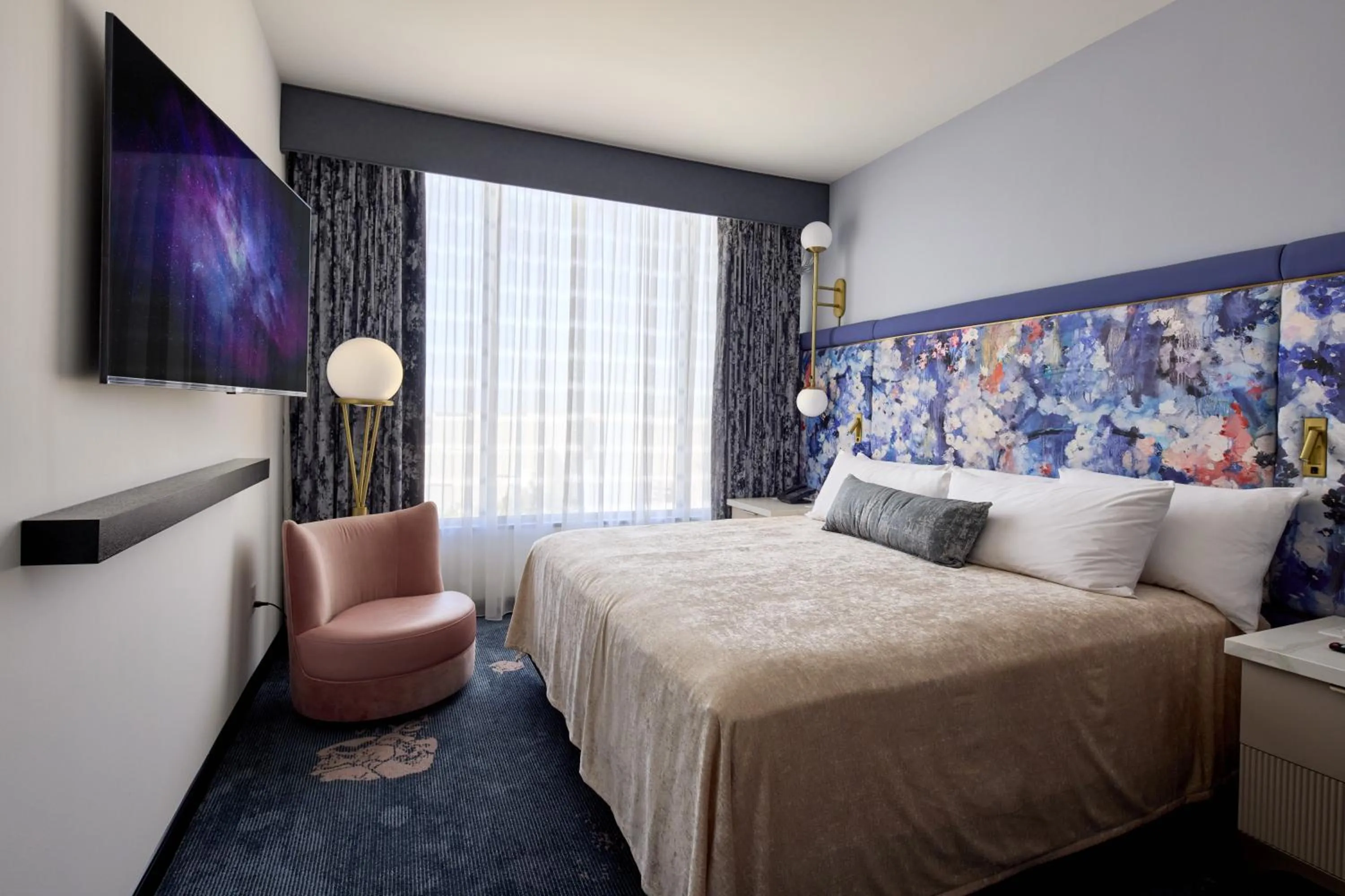 Bedroom, Bed in Universal's Helios Grand Hotel, a Loews Hotel