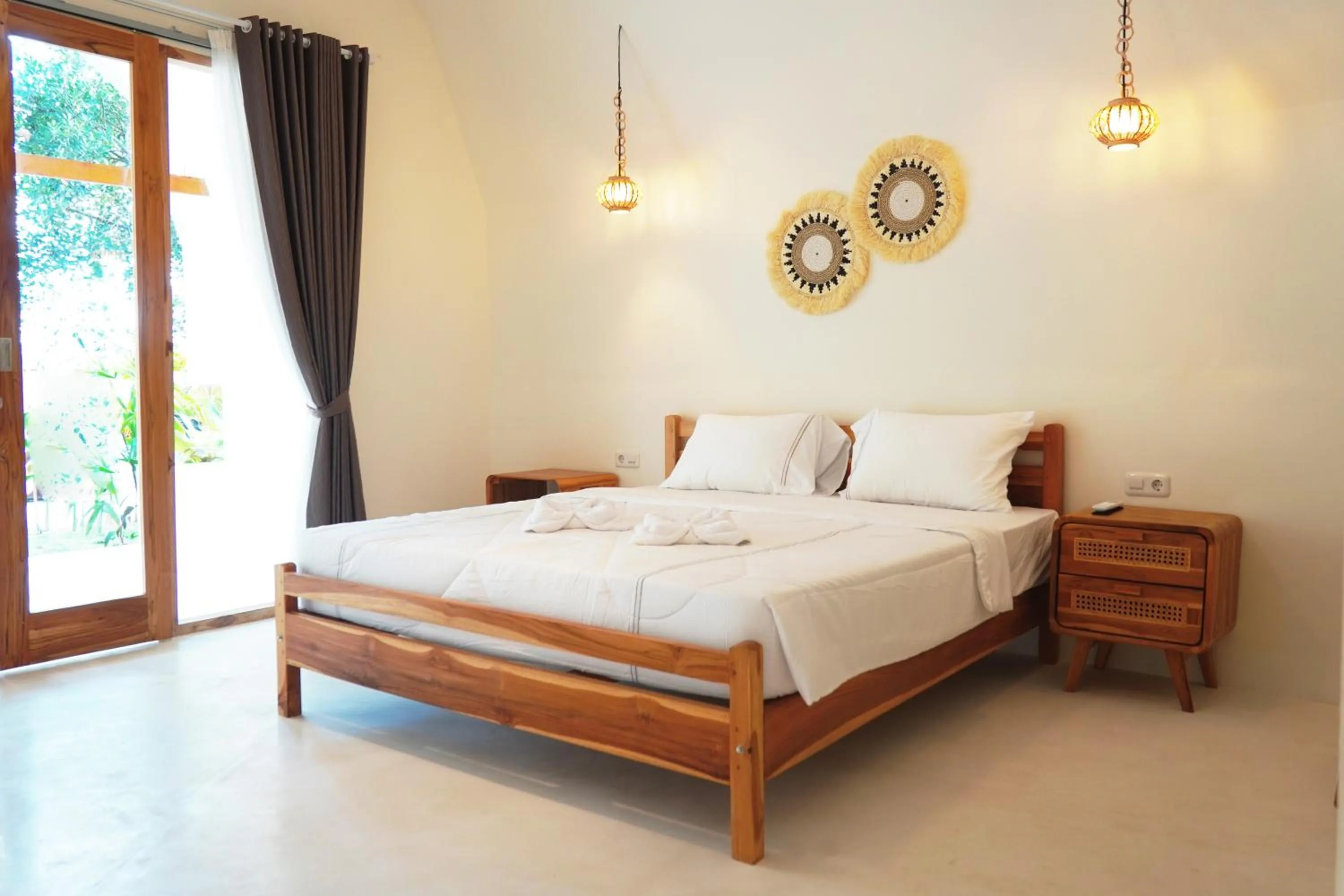 Bed in Jungle Bungalows
