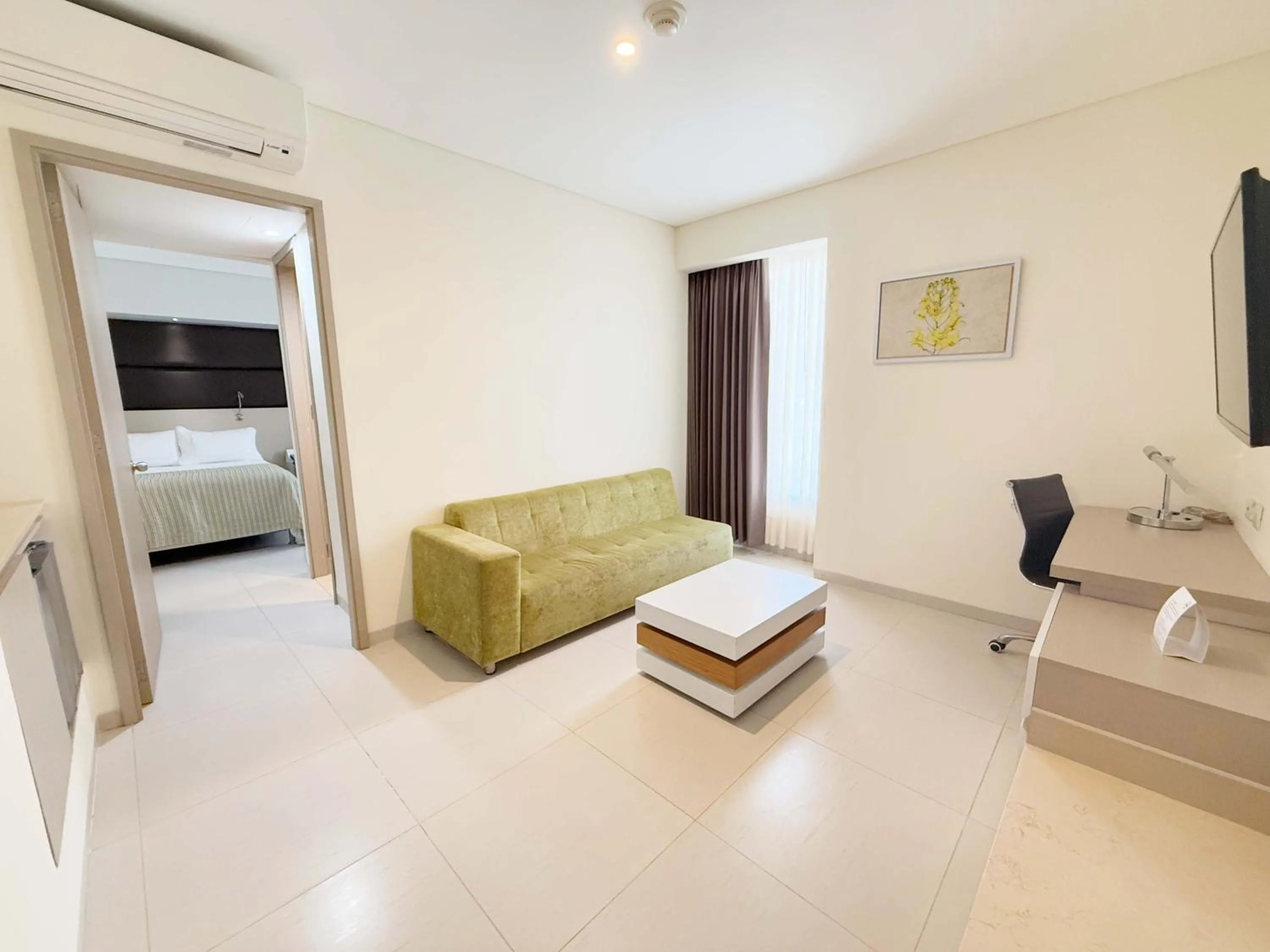 Living room, Bed in Wyndham Garden Barranquilla