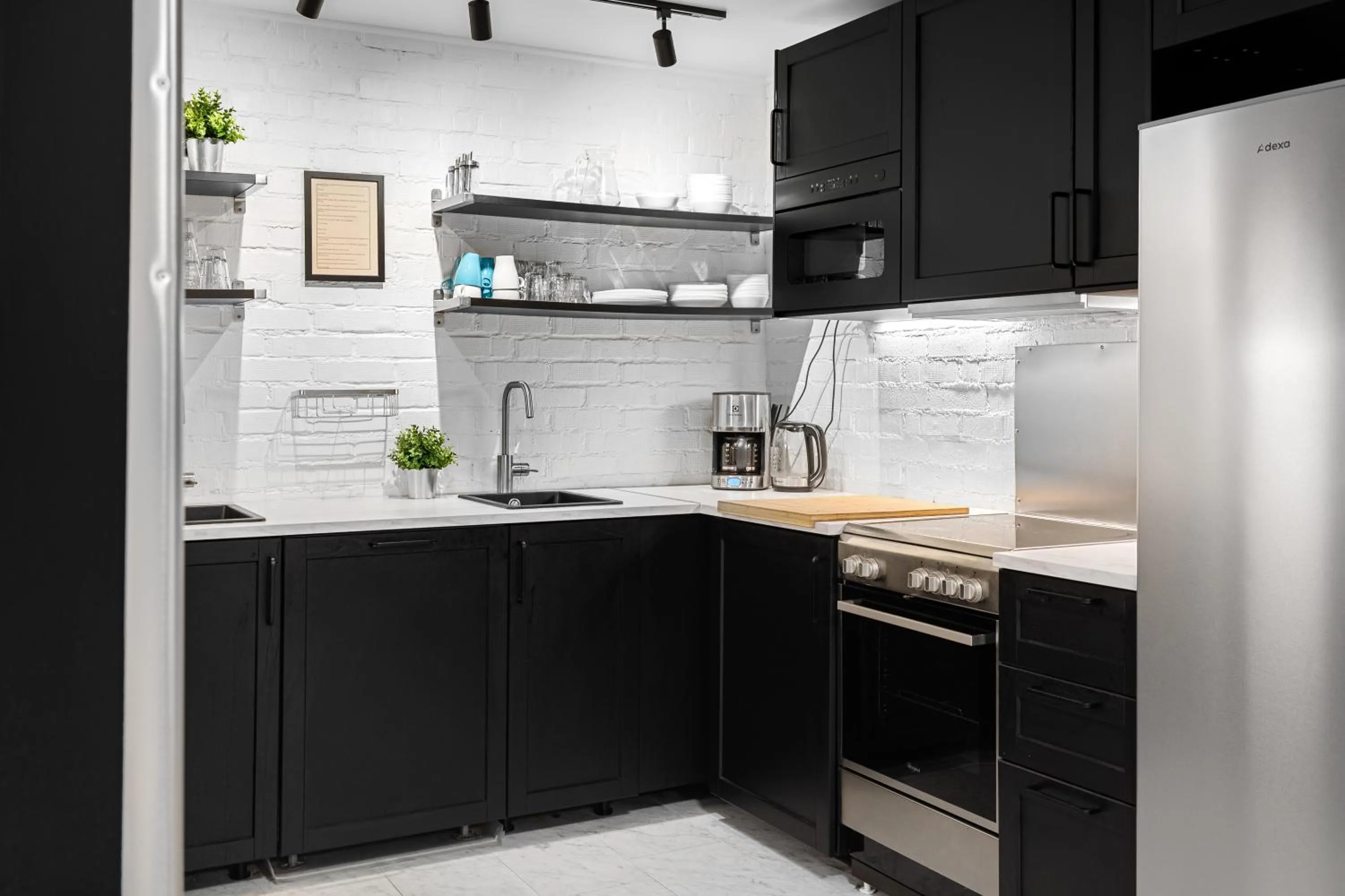 Communal kitchen in Kallhällsbaden Strandhotell