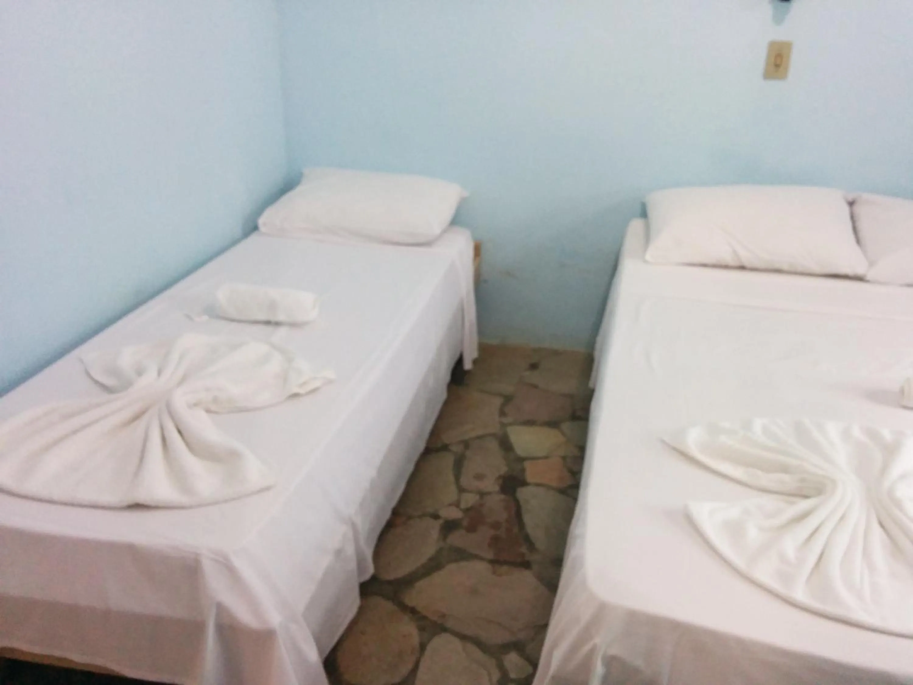 Bed in Pousada Norage