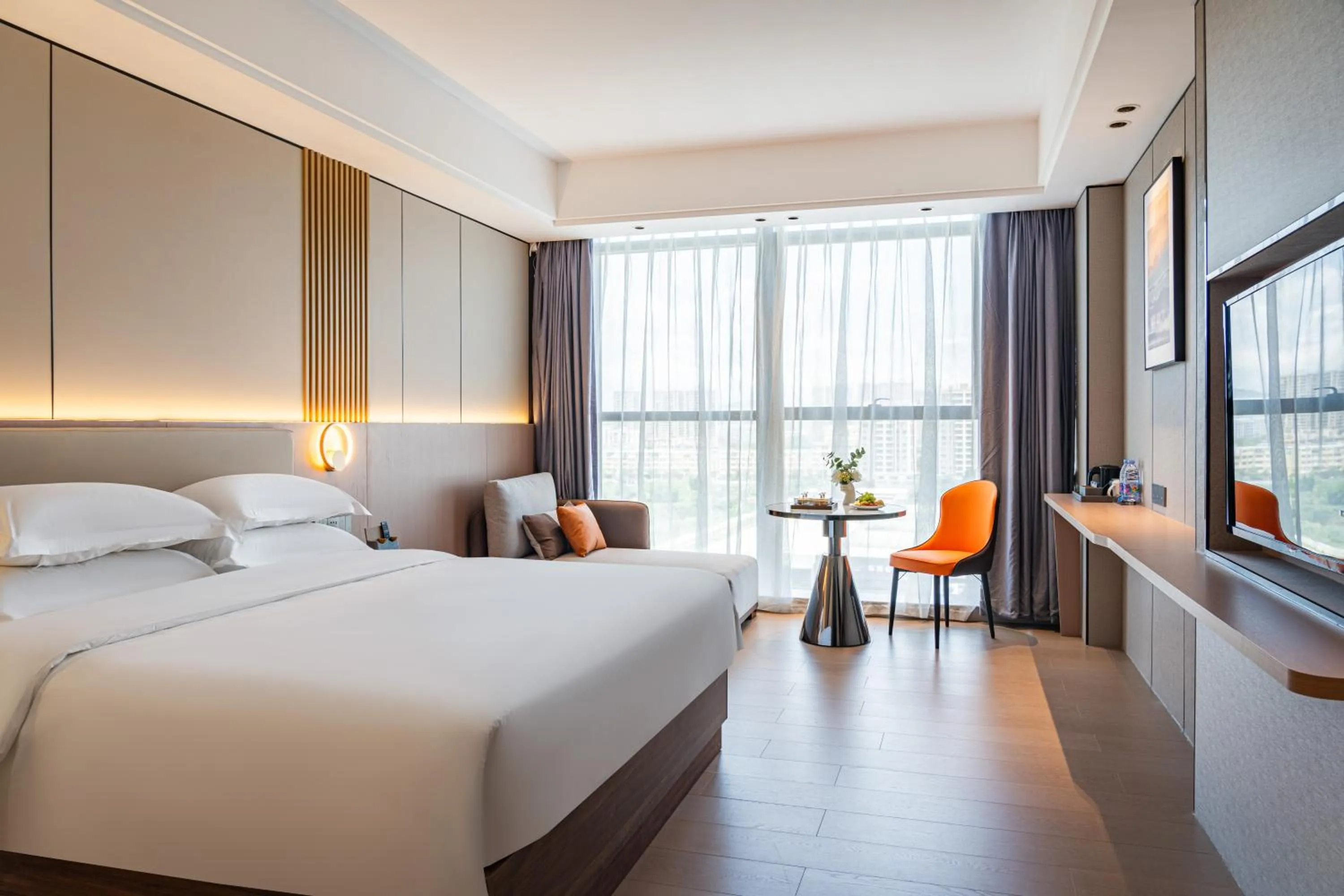 Communal lounge/ TV room, Bed in Poltton Century Hotel Yangjiang Jinshan Road