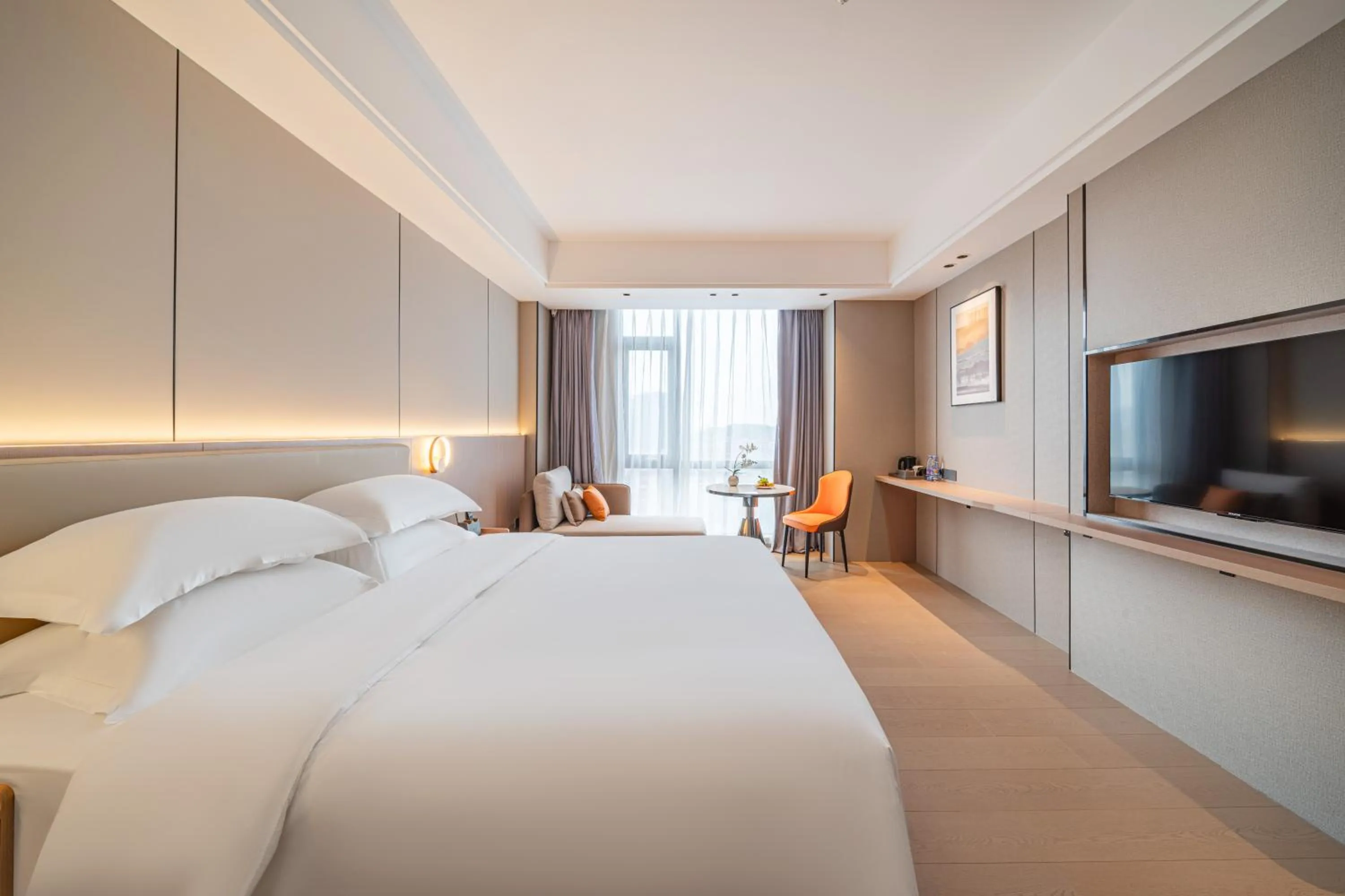 Communal lounge/ TV room, Bed in Poltton Century Hotel Yangjiang Jinshan Road