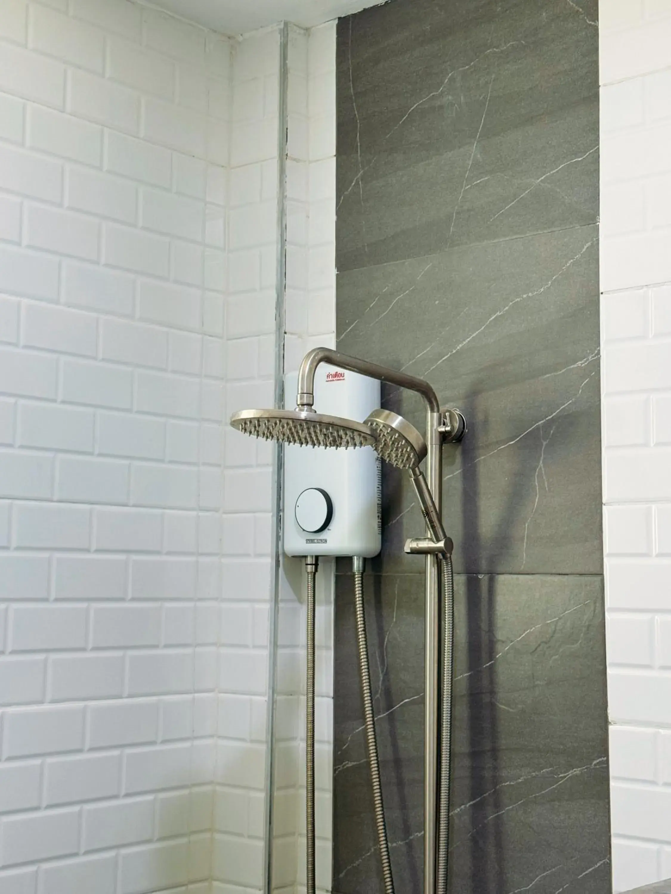 Shower in Reboot Beach Resort, Restaurant, and Coffee Shop Shower in Reboot Beach Resort, Restaurant, and Coffee Shop