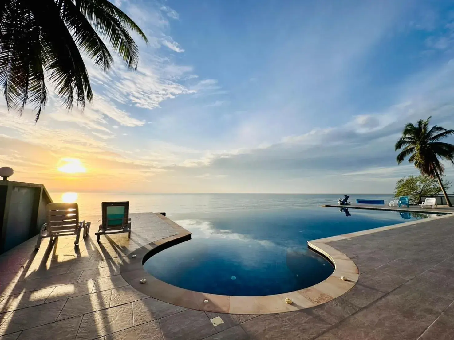 Swimming pool in Reboot Beach Resort, Restaurant, and Coffee Shop Swimming pool in Reboot Beach Resort, Restaurant, and Coffee Shop