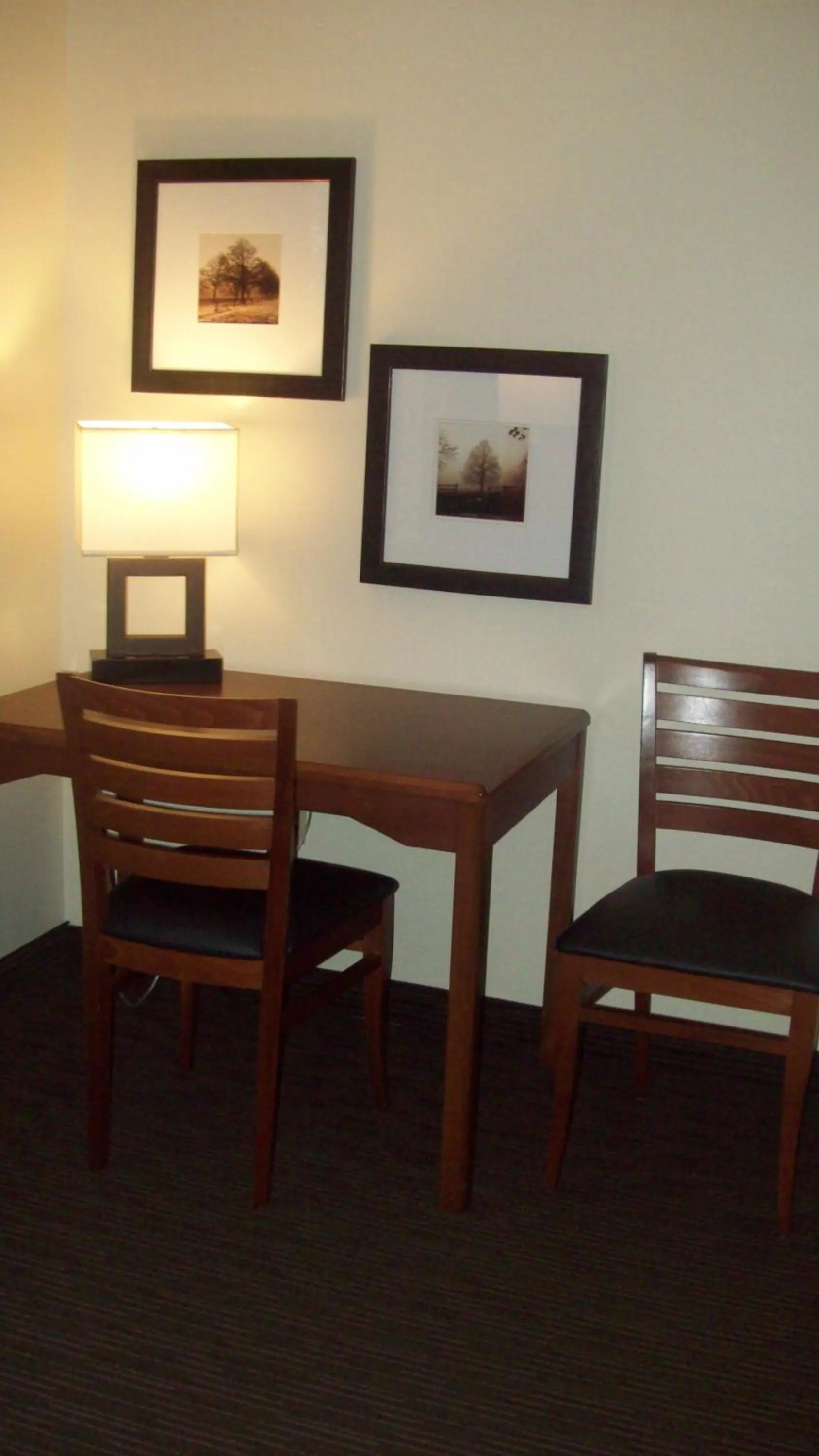 Dining area in AmericInn by Wyndham Silver City