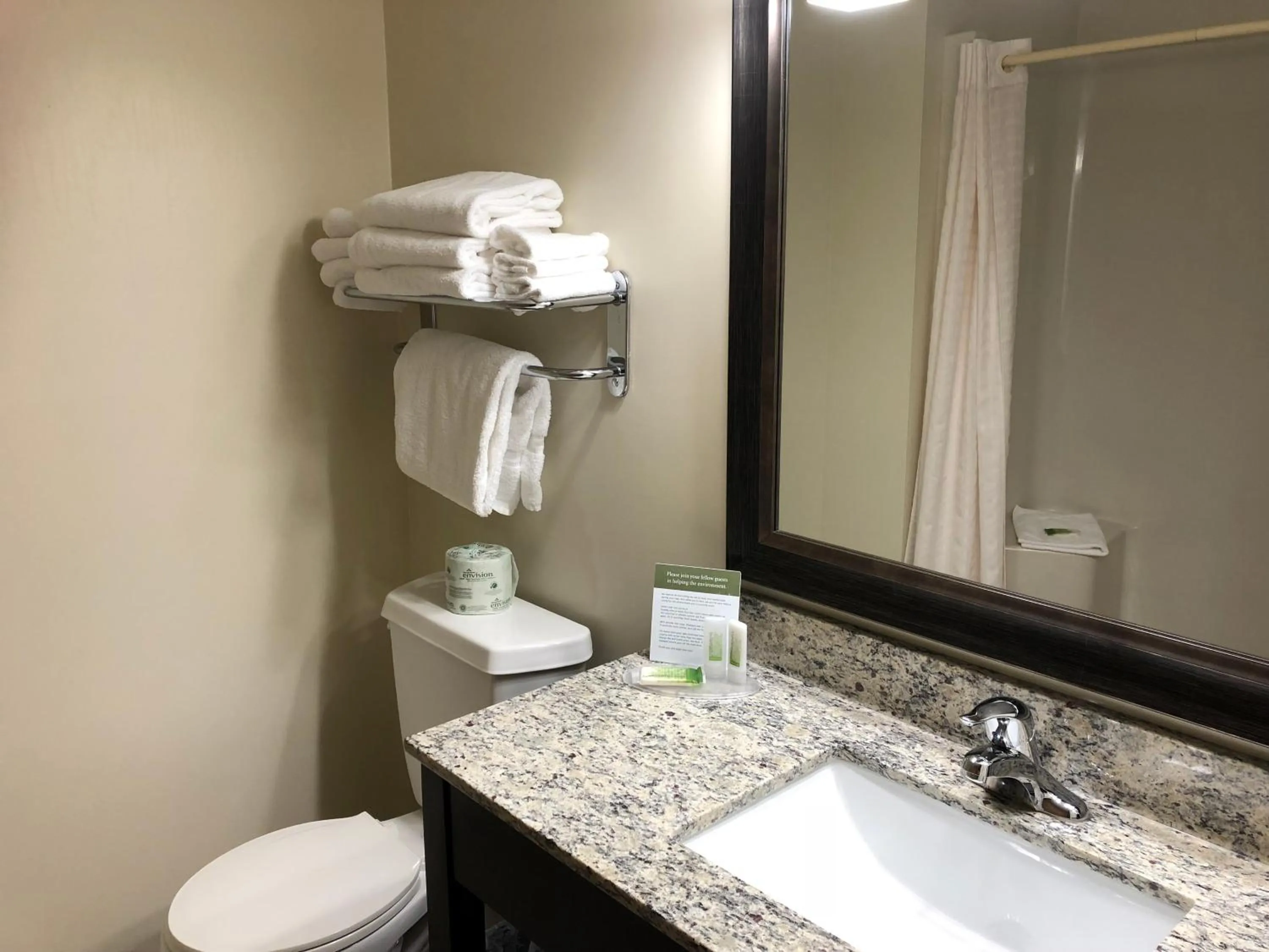 Toilet in AmericInn by Wyndham Silver City