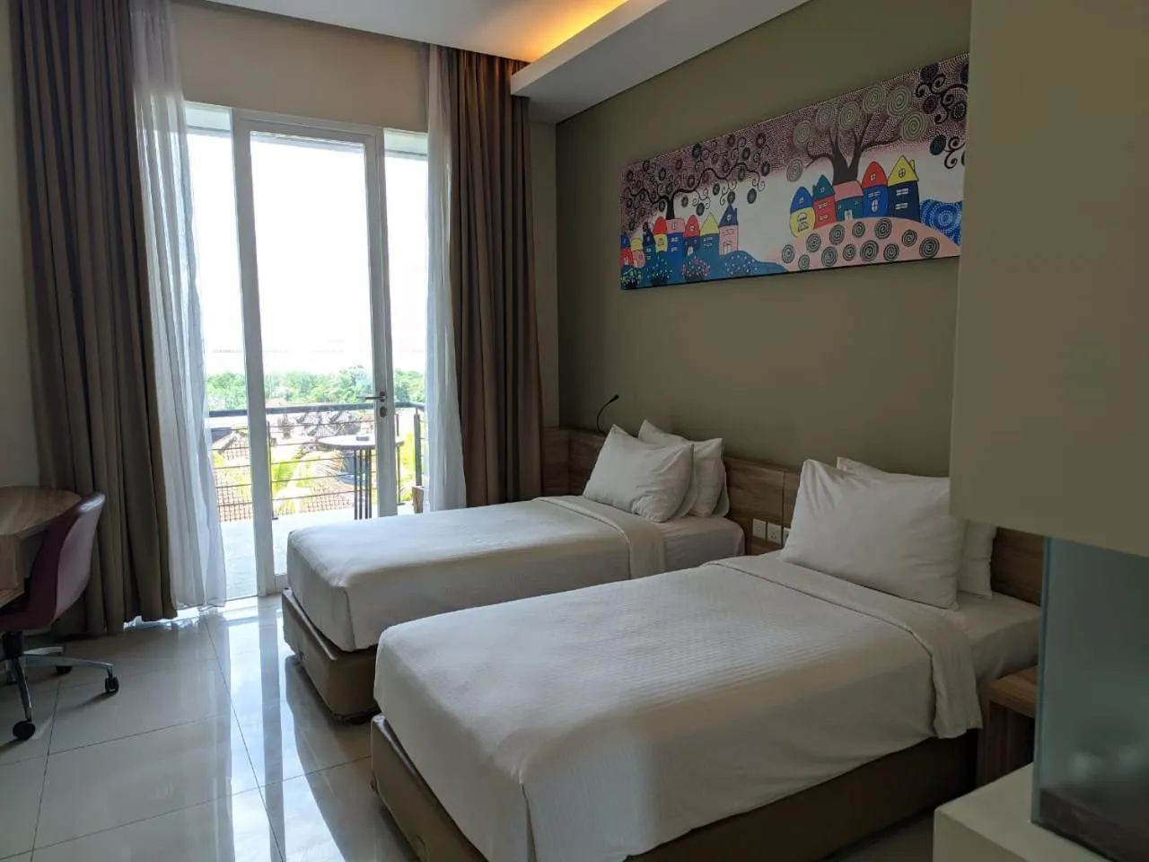 Bed in Mahogany Hotel