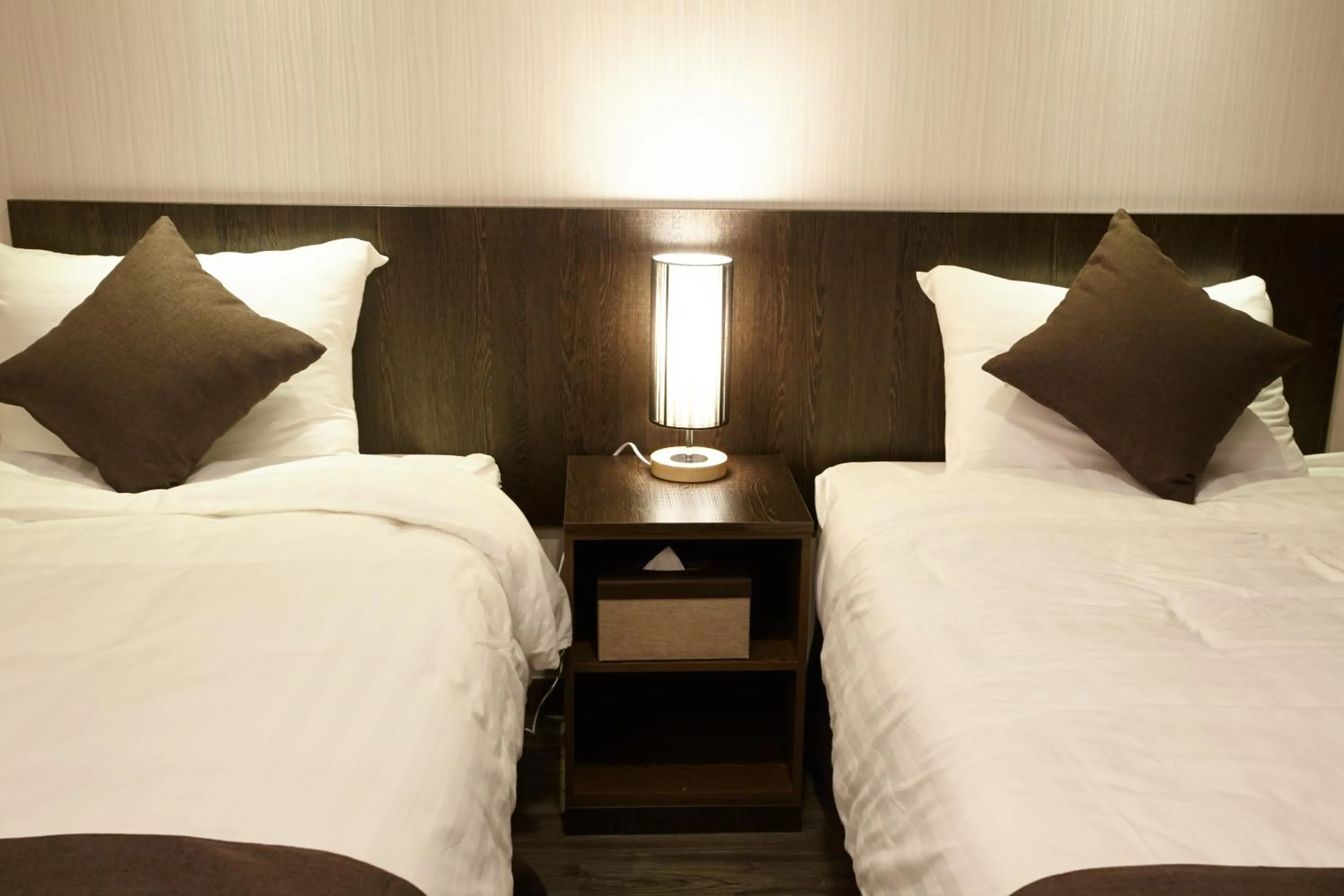 Bed in CS Premier Hotel