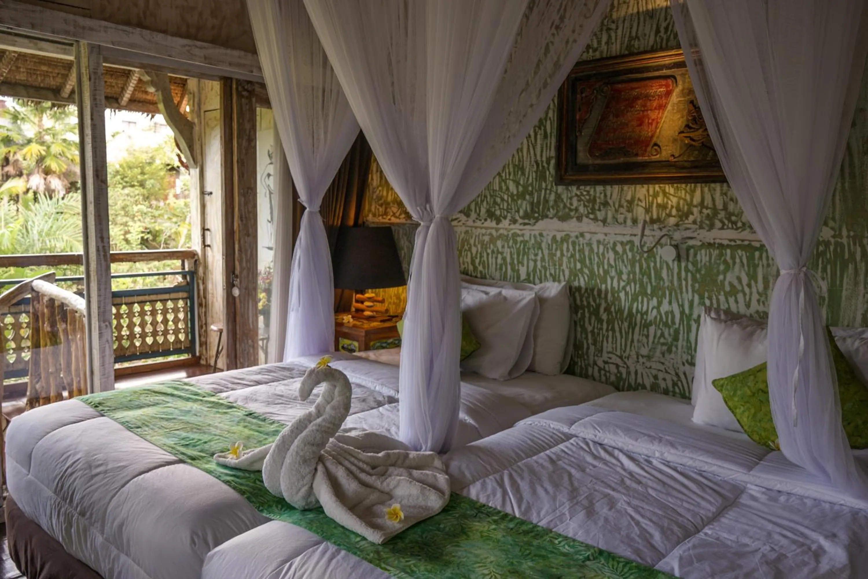 Bed in KTS Balinese Villas