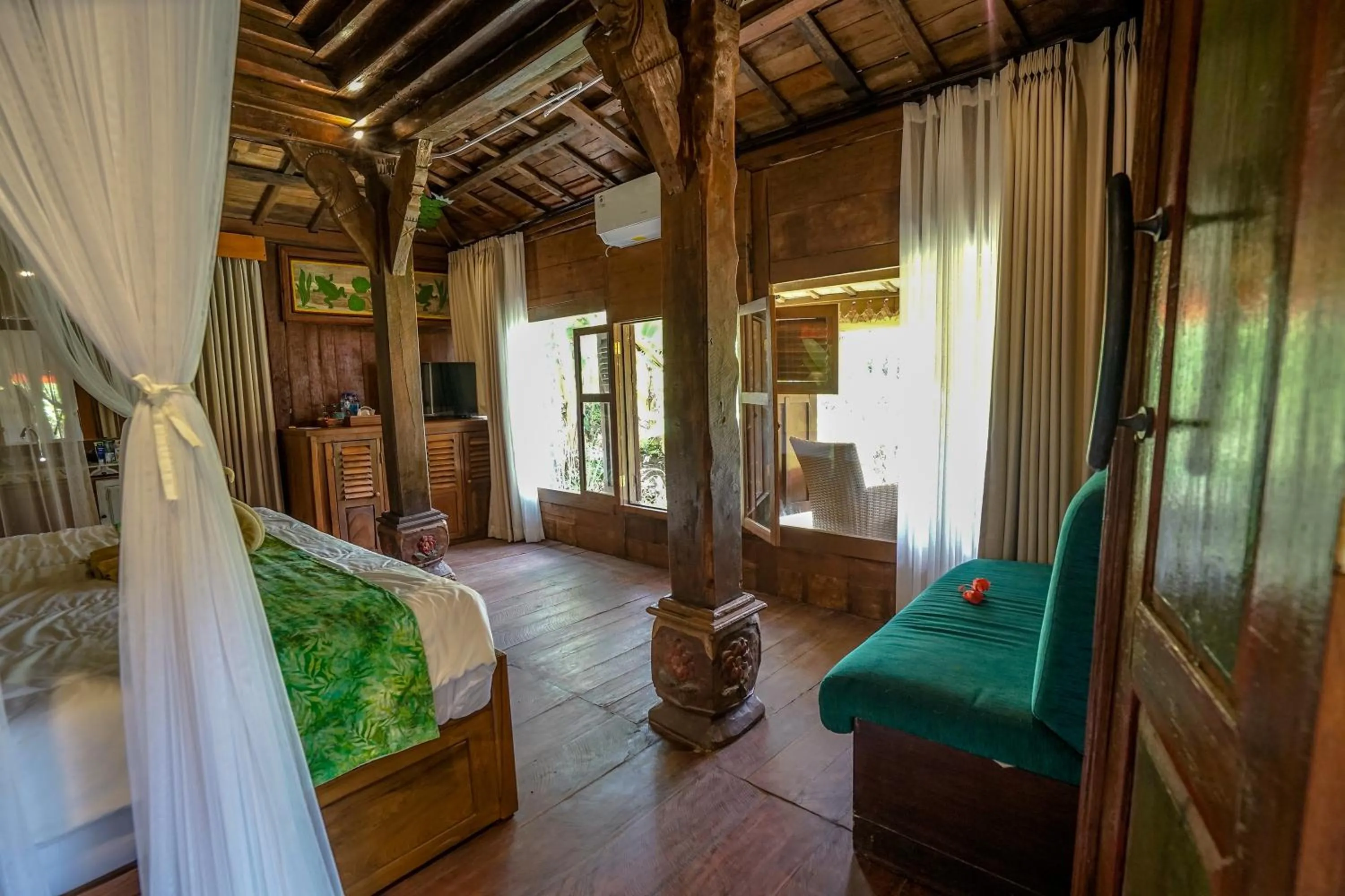 Bed in KTS Balinese Villas