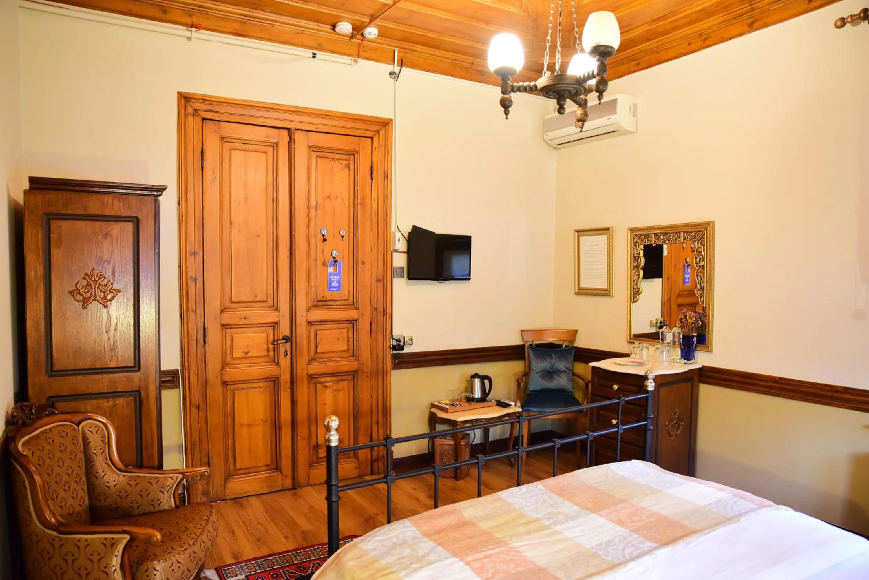 Photo of the whole room, Bed in Ottoman Suites by Sera House