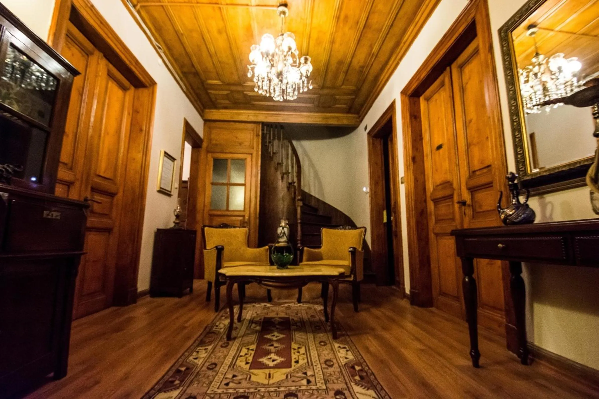 Communal lounge/ TV room in Ottoman Suites by Sera House