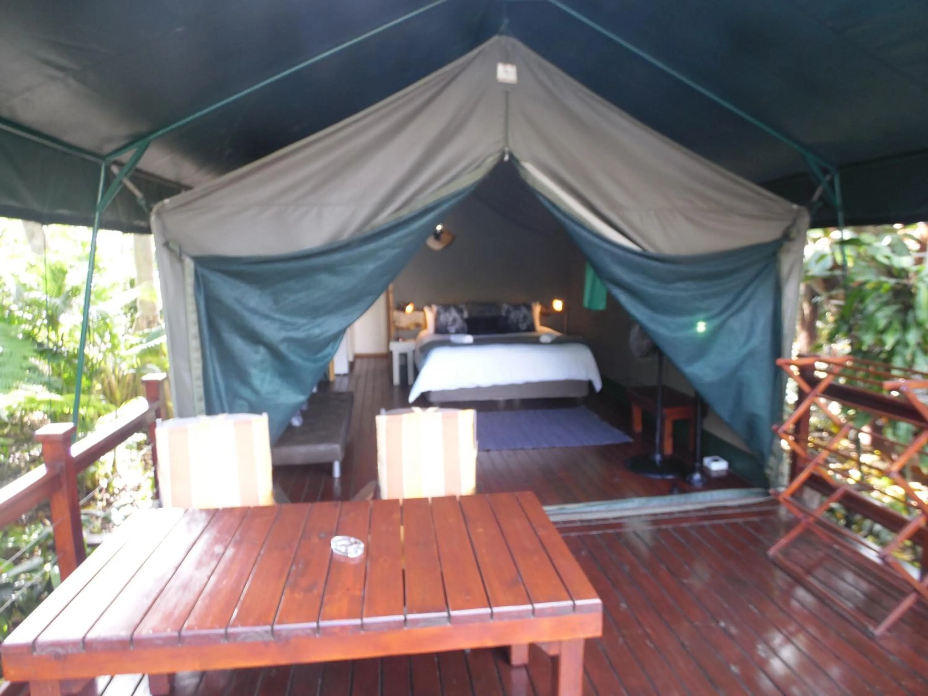 Balcony/Terrace, Bed in Luxury Tented Village @ Urban Glamping