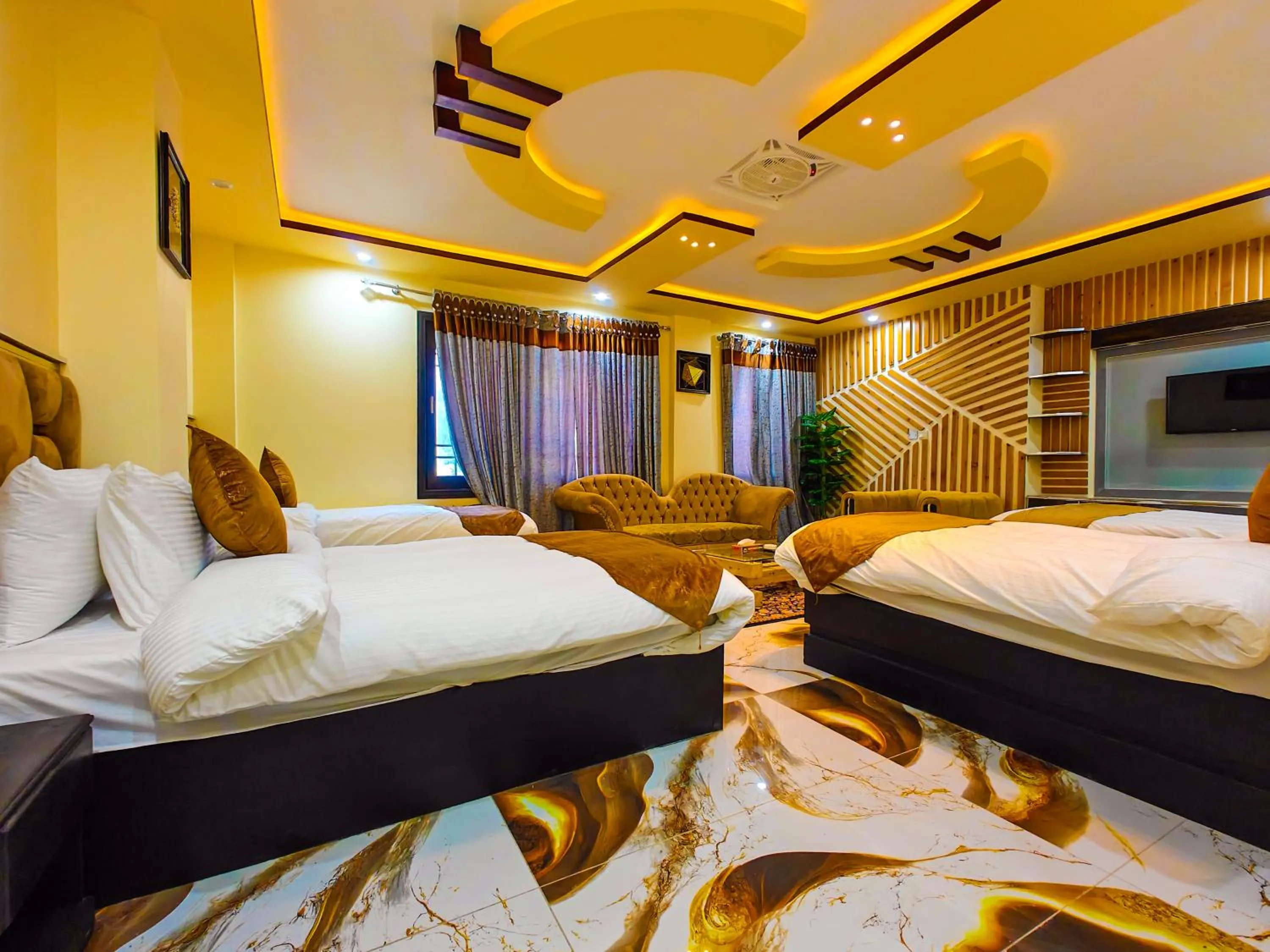 Bed in Kabirs Hotel Kalam
