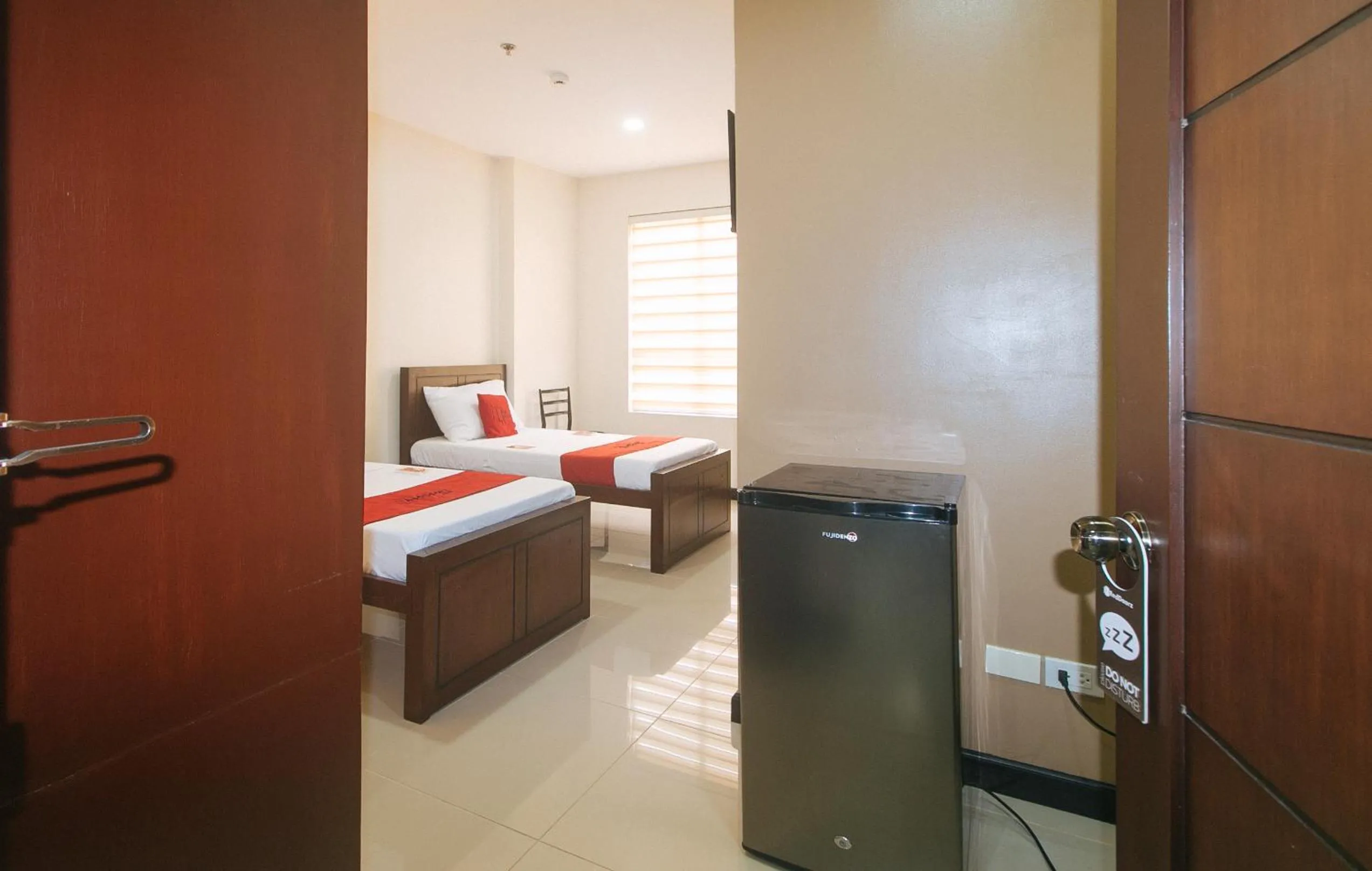 Photo of the whole room, Bed in RedDoorz at Nucell