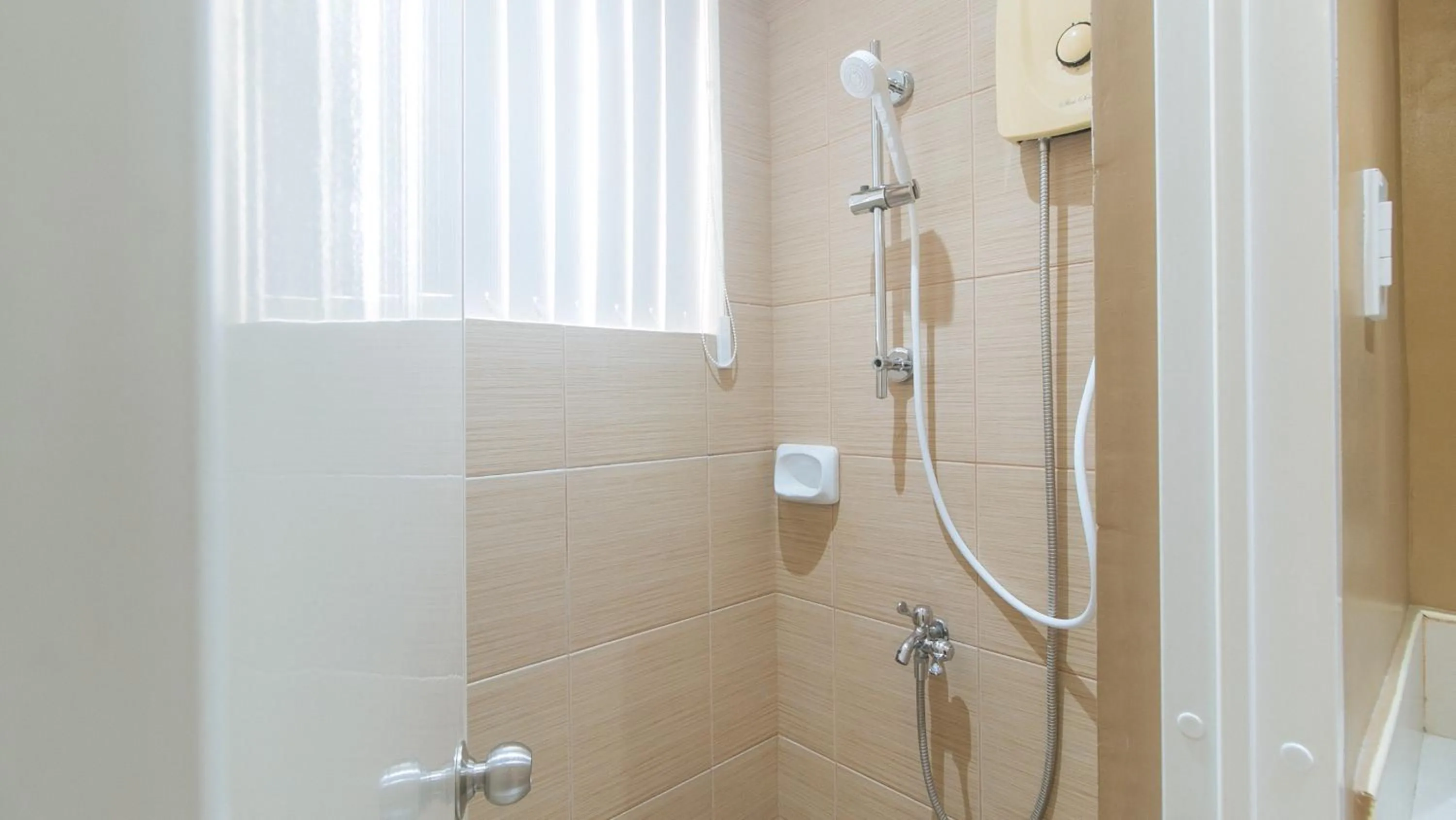 Shower in RedDoorz at Nucell