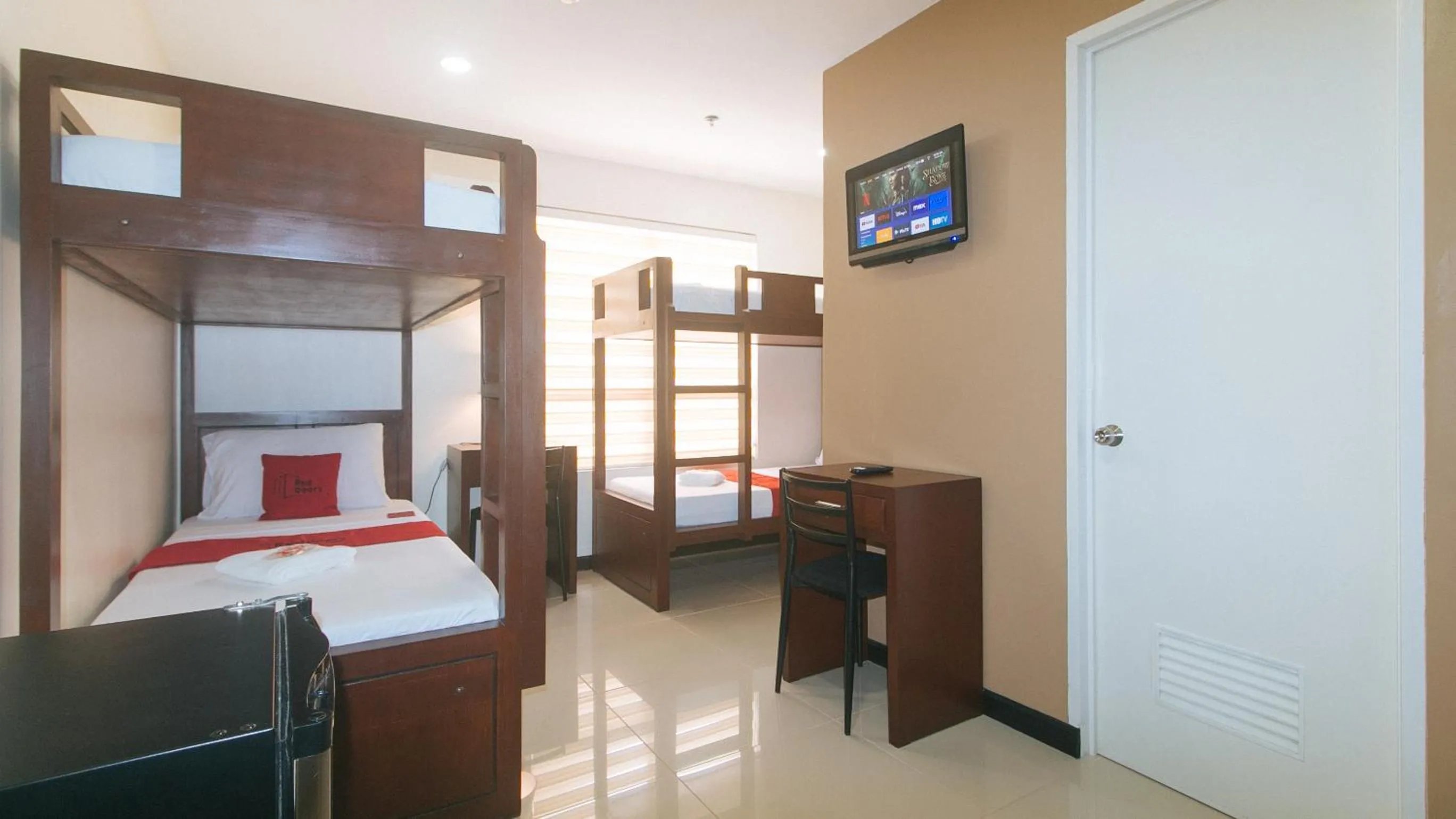 Photo of the whole room, Bed in RedDoorz at Nucell