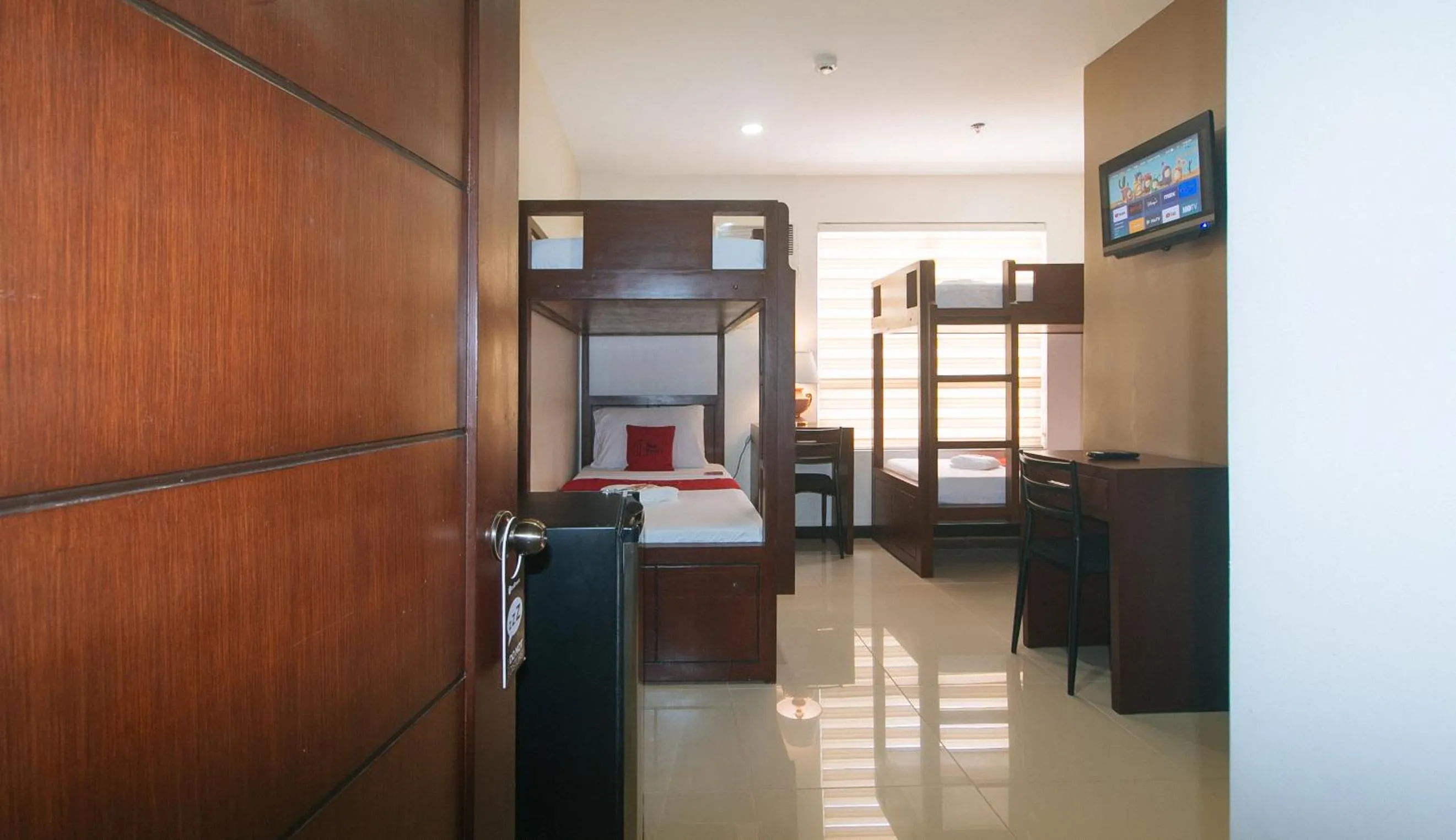 Photo of the whole room, Bed in RedDoorz at Nucell