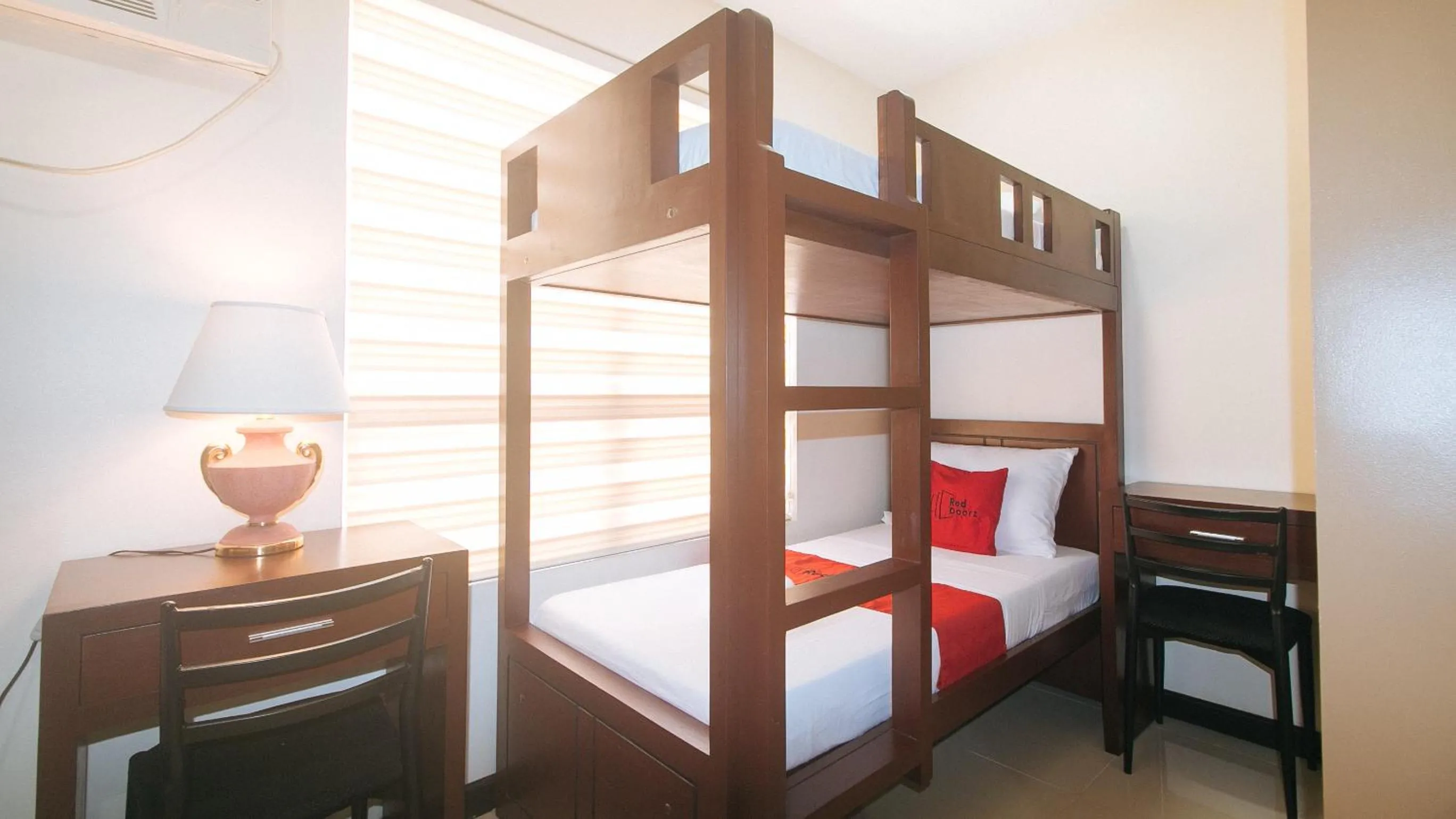 Photo of the whole room, Bed in RedDoorz at Nucell