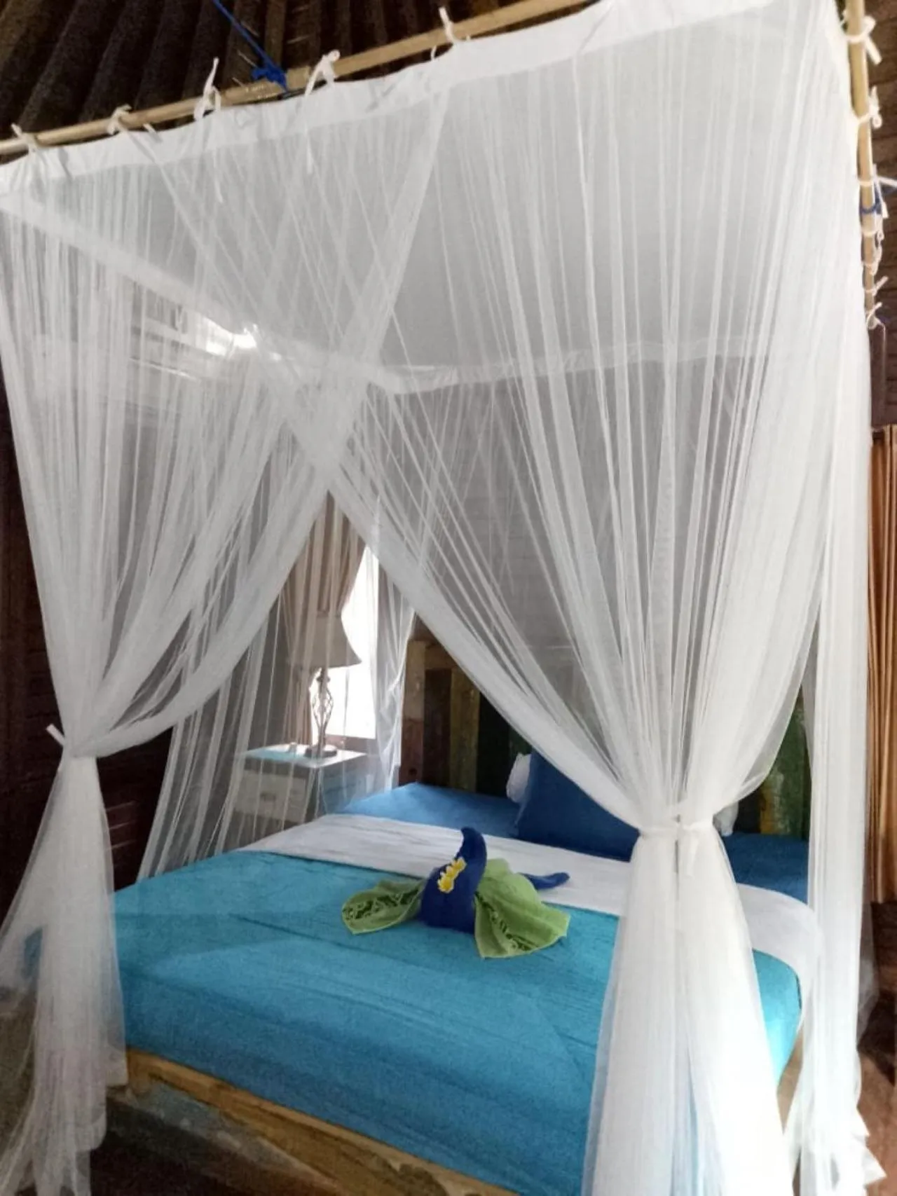 Bed in Raira's Villas Lembongan