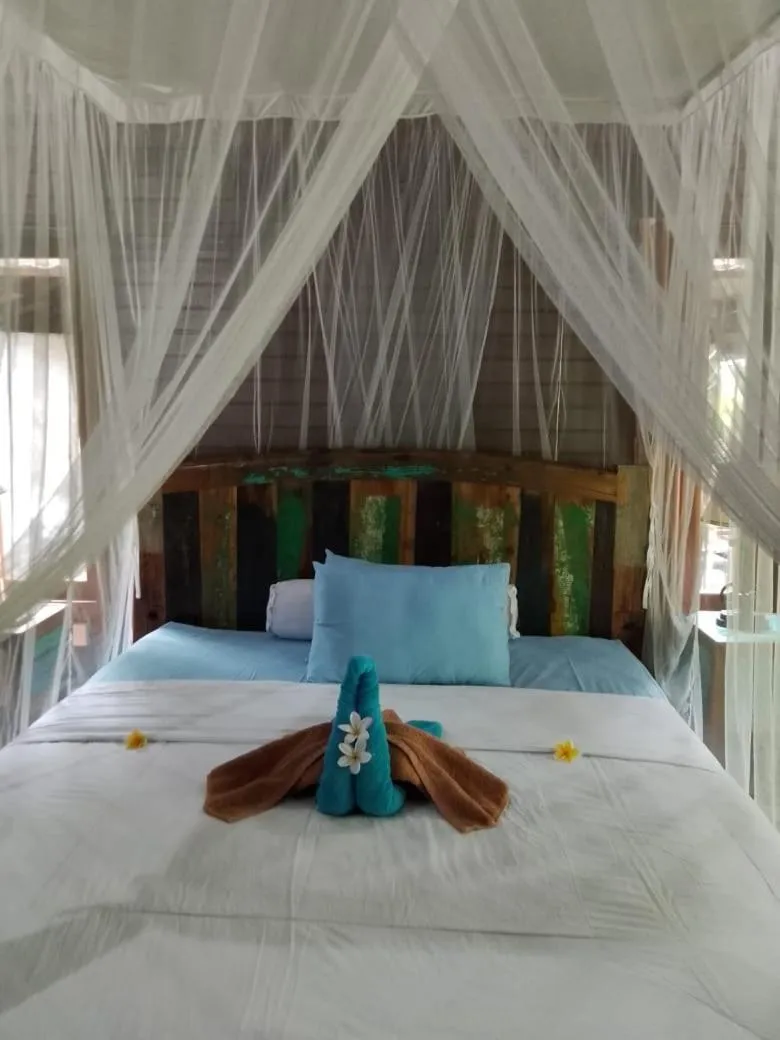 Bed in Raira's Villas Lembongan