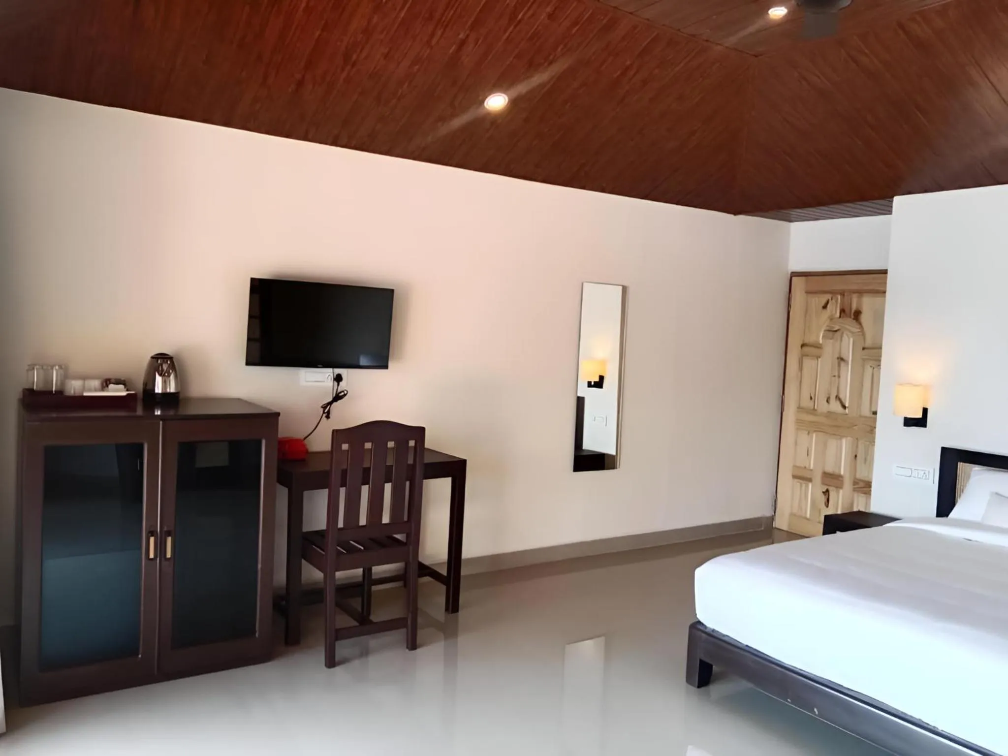 Communal lounge/ TV room, Bed in Destiny Goa Beach Resort
