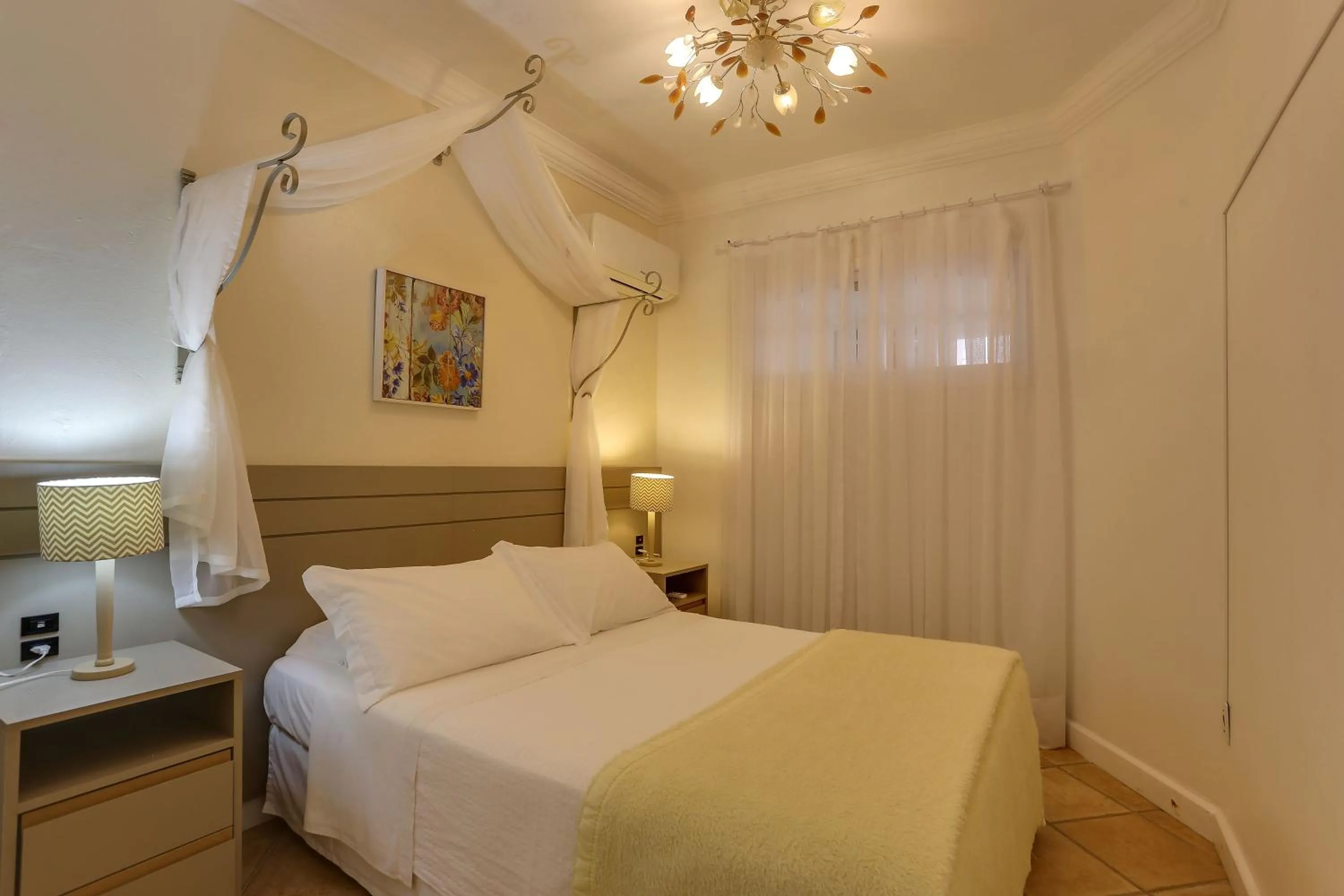 Bedroom, Bed in Villas Jurerê Residences