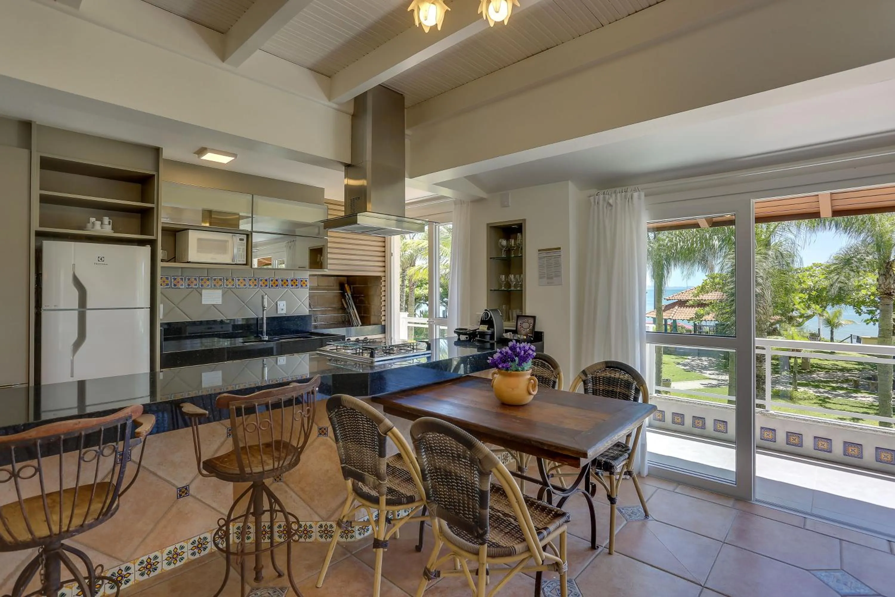 Kitchen or kitchenette in Villas Jurerê Residences