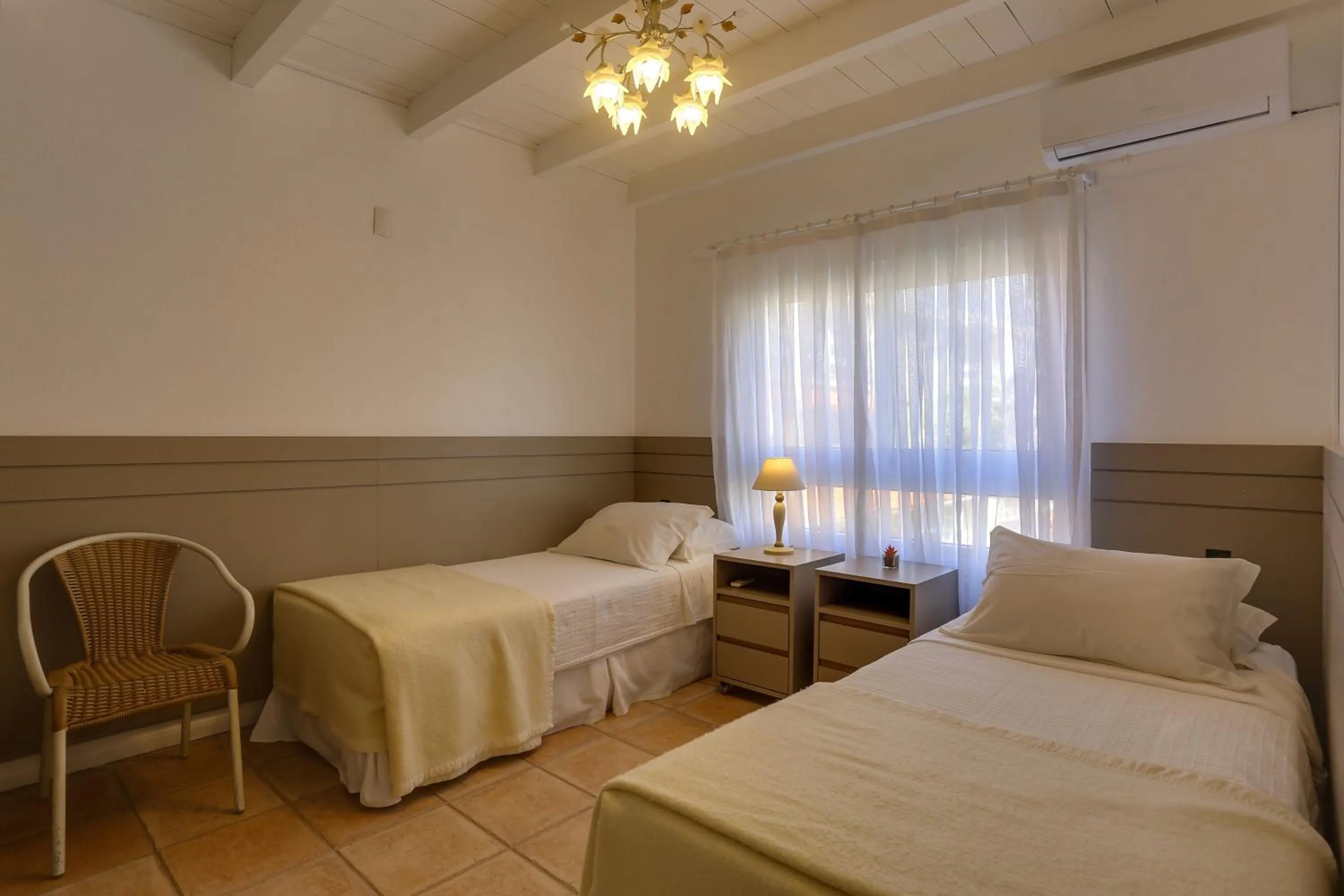 Bedroom, Bed in Villas Jurerê Residences