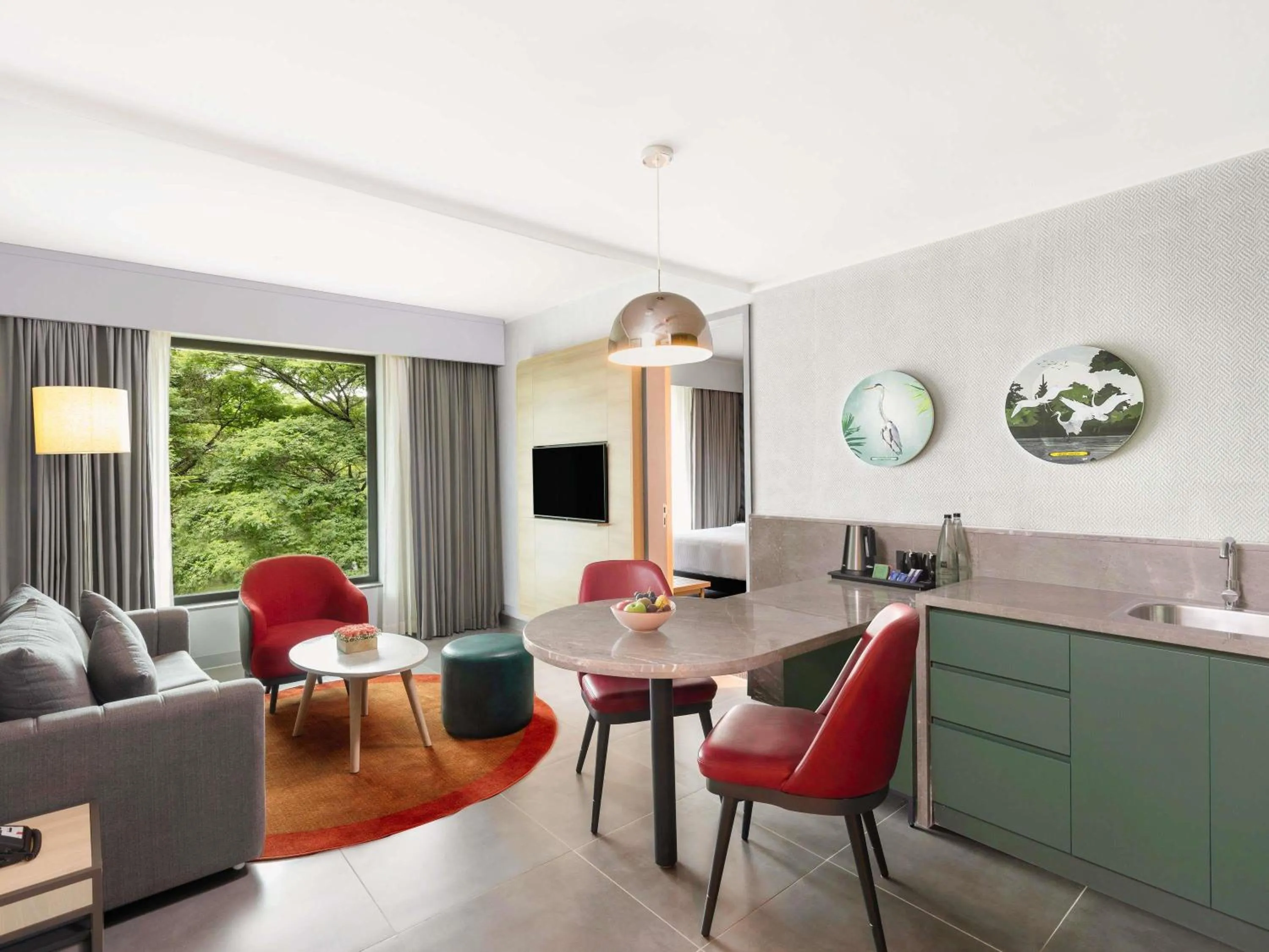 Bedroom in ibis Styles Mysuru