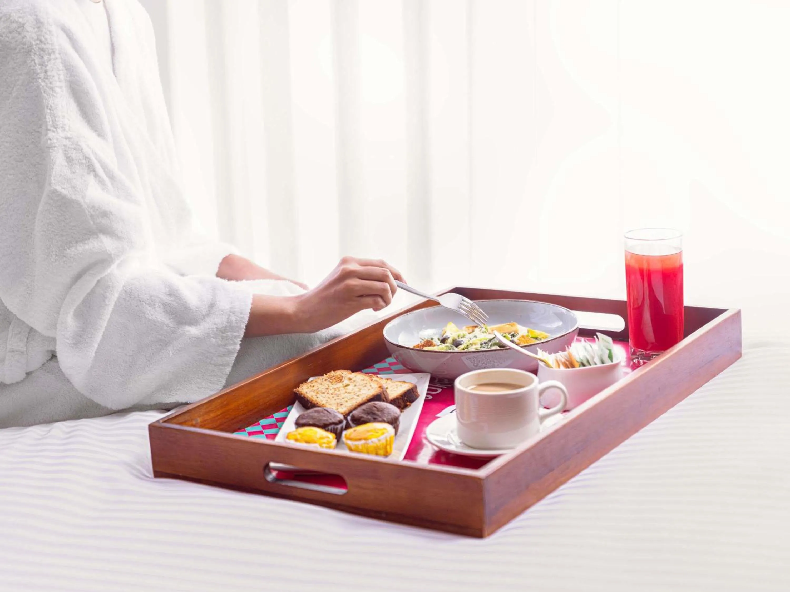 Bedroom in ibis Styles Mysuru