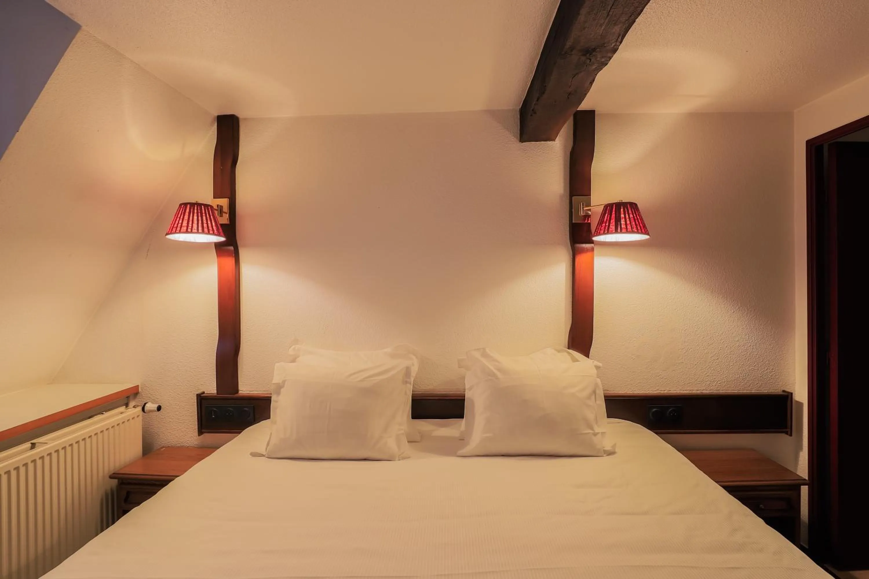 Bed in Hôtel Les Trois Luppars