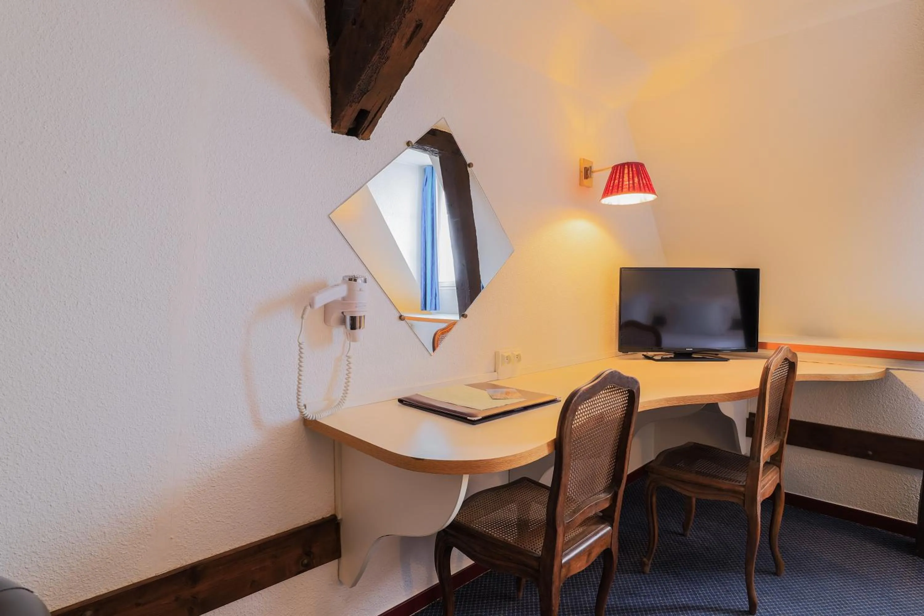 Seating area in Hôtel Les Trois Luppars
